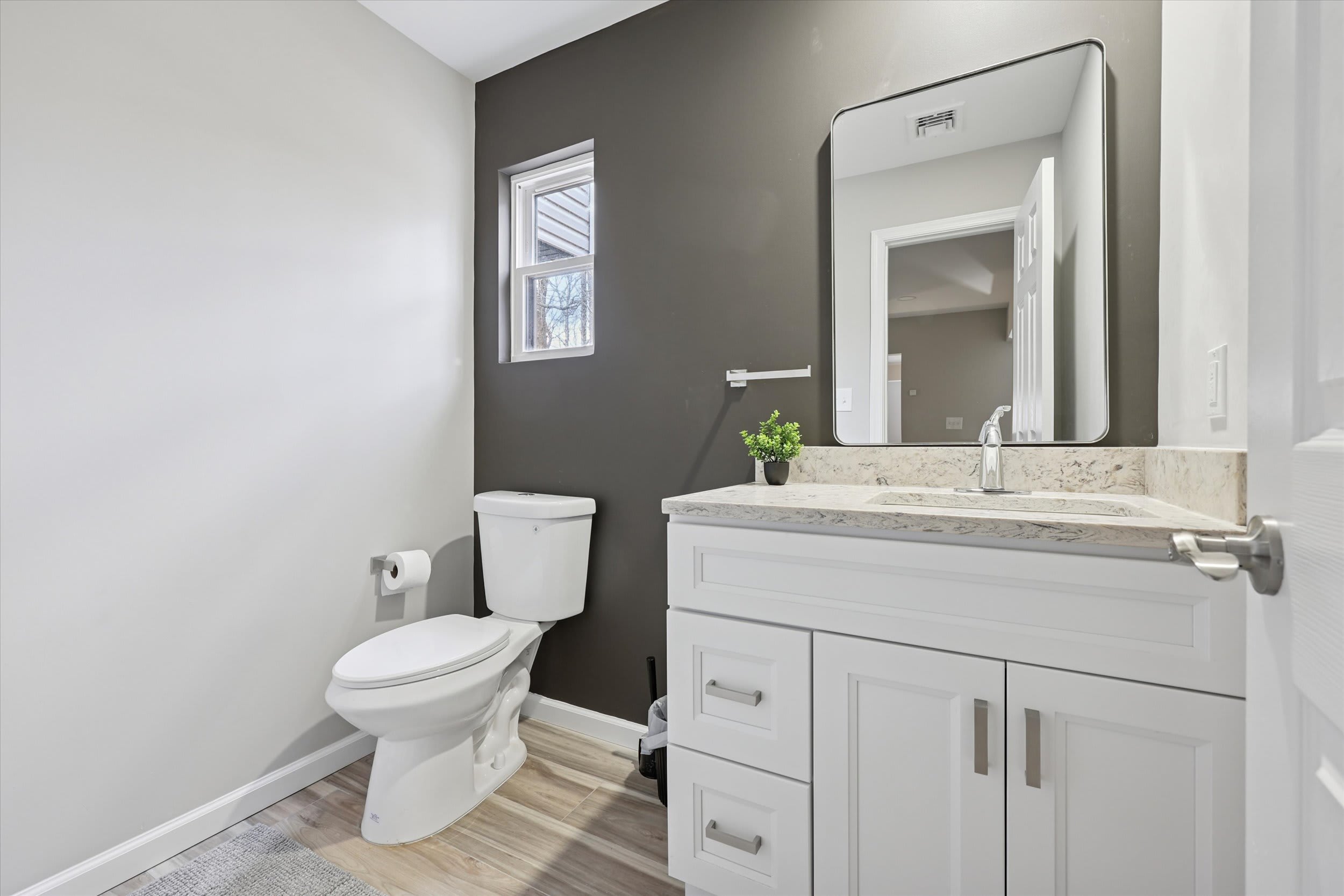 Clean and well-lit bathroom for guest convenience