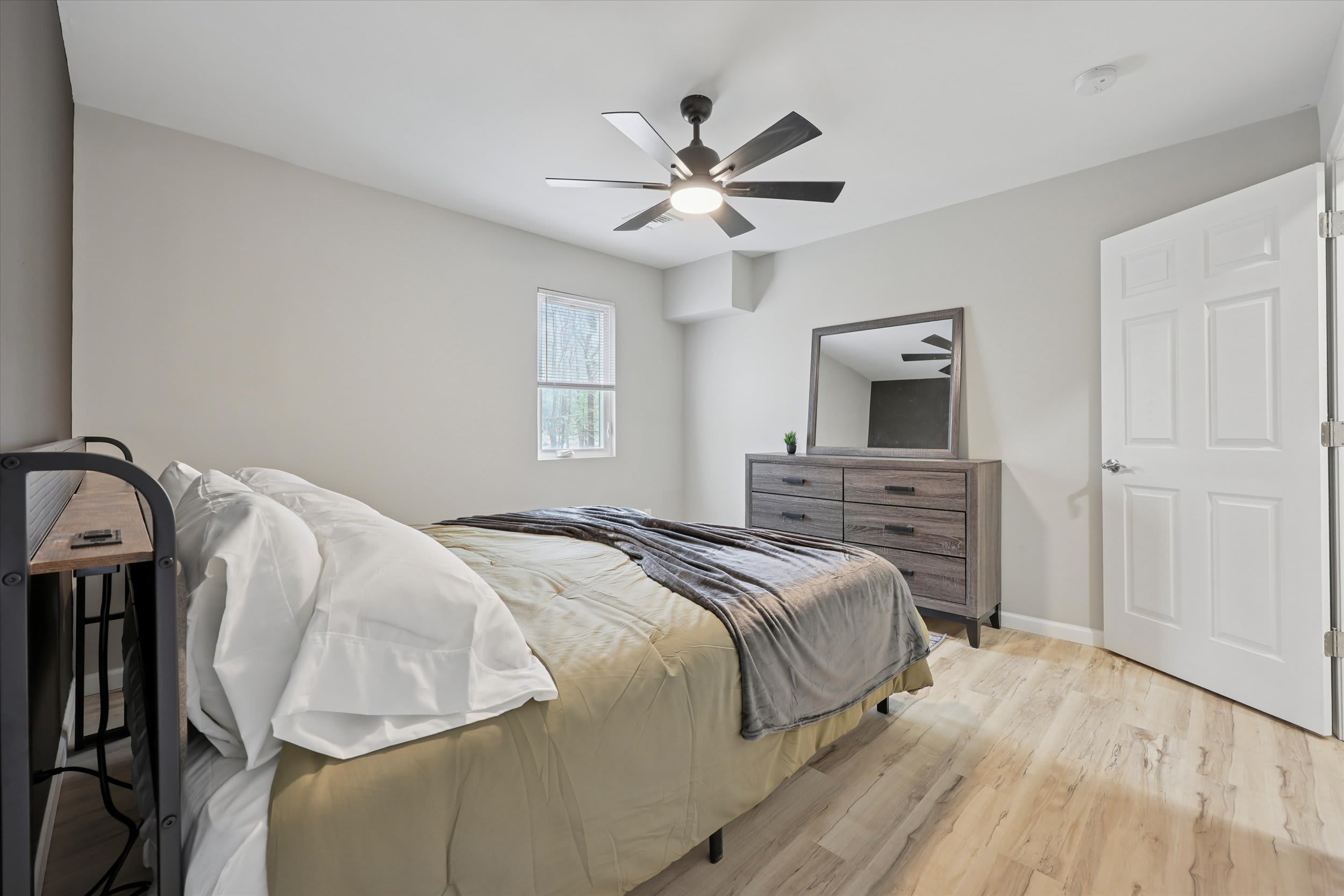 Wake up refreshed in this bright bedroom with natural light