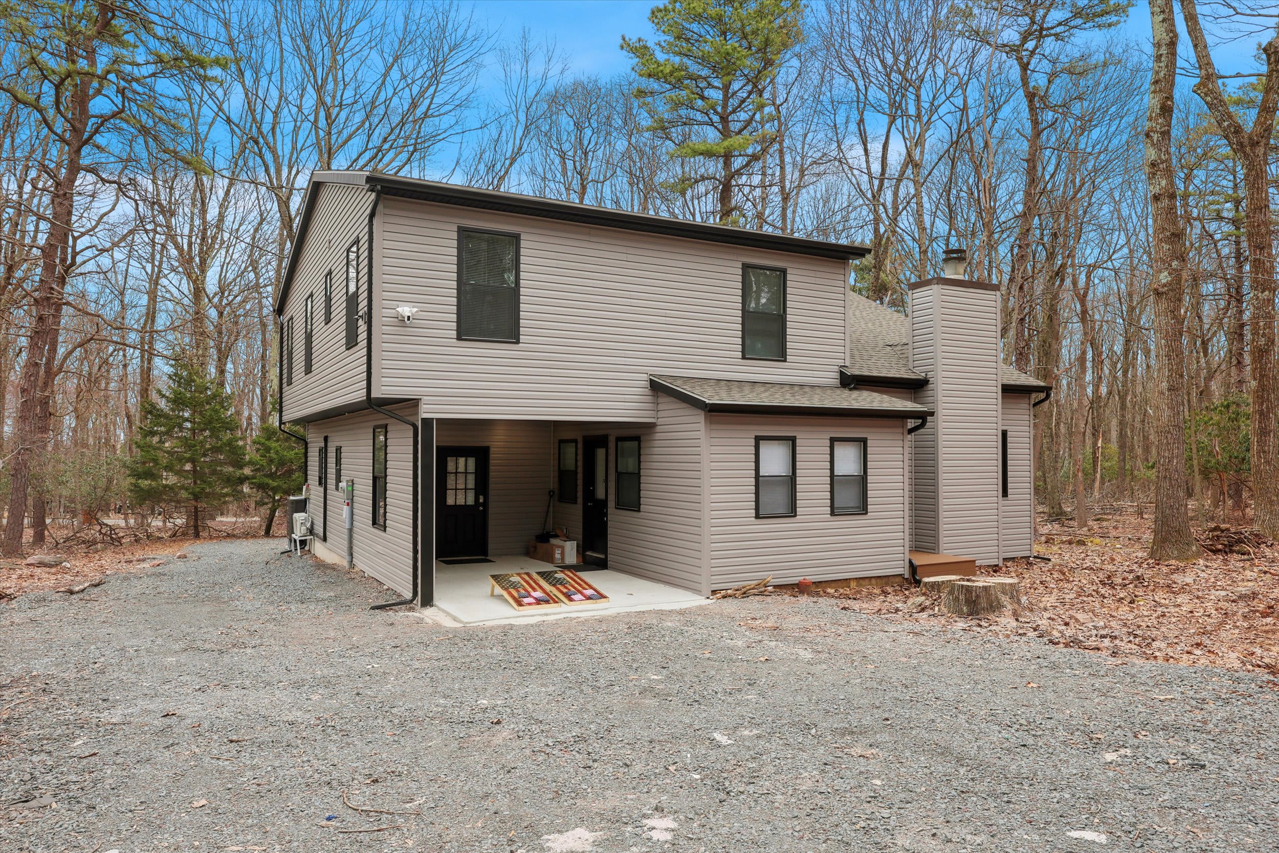 Your wooded retreat awaits among the peaceful Poconos surroundings