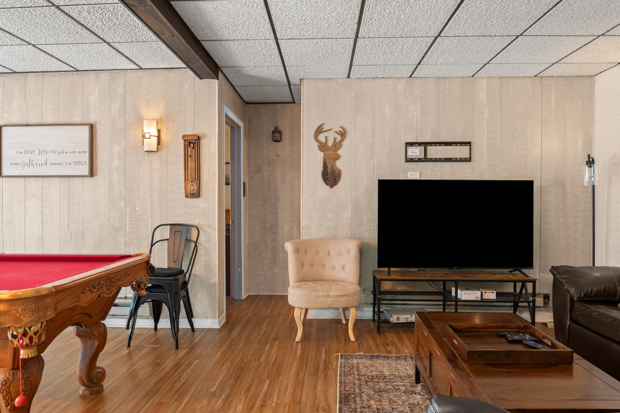 Rustic touches and a big screen TV make this the ultimate hangout spot