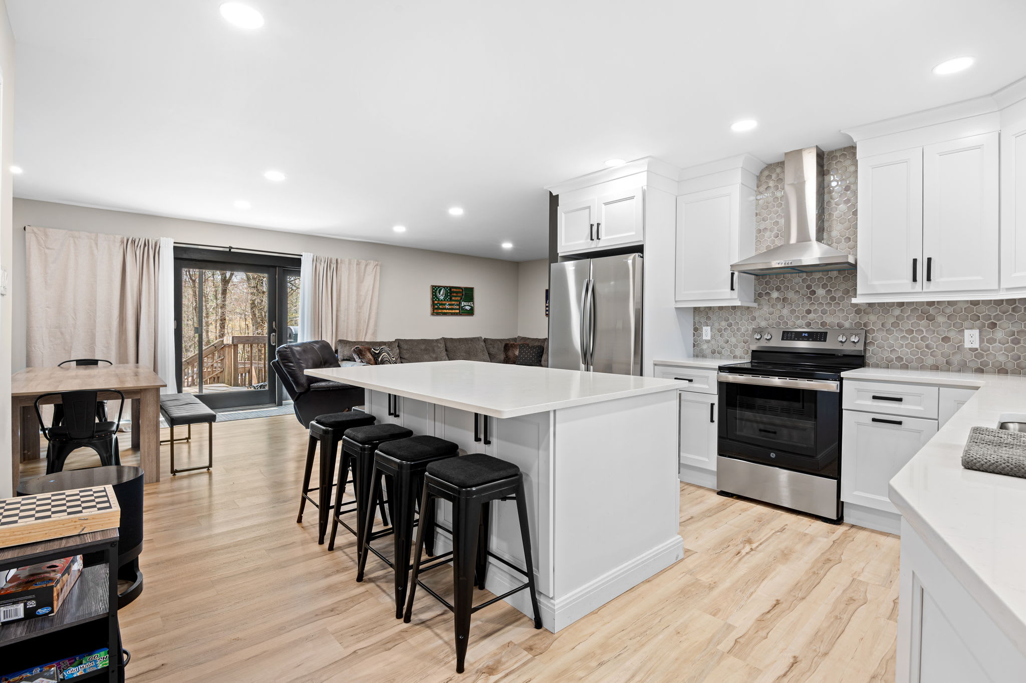 Cook up a feast in this spacious kitchen with island seating for four