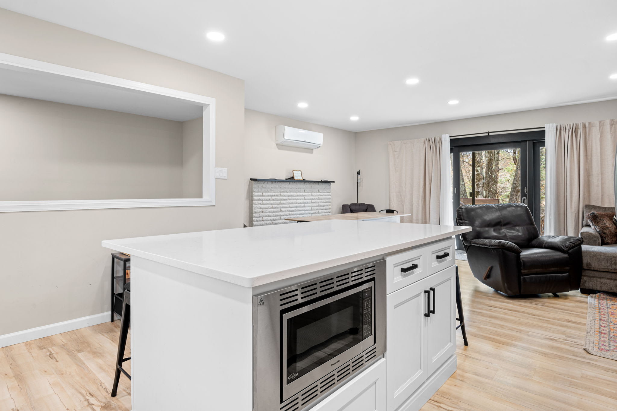 Open floor plan connects kitchen to living spaces for easy entertaining