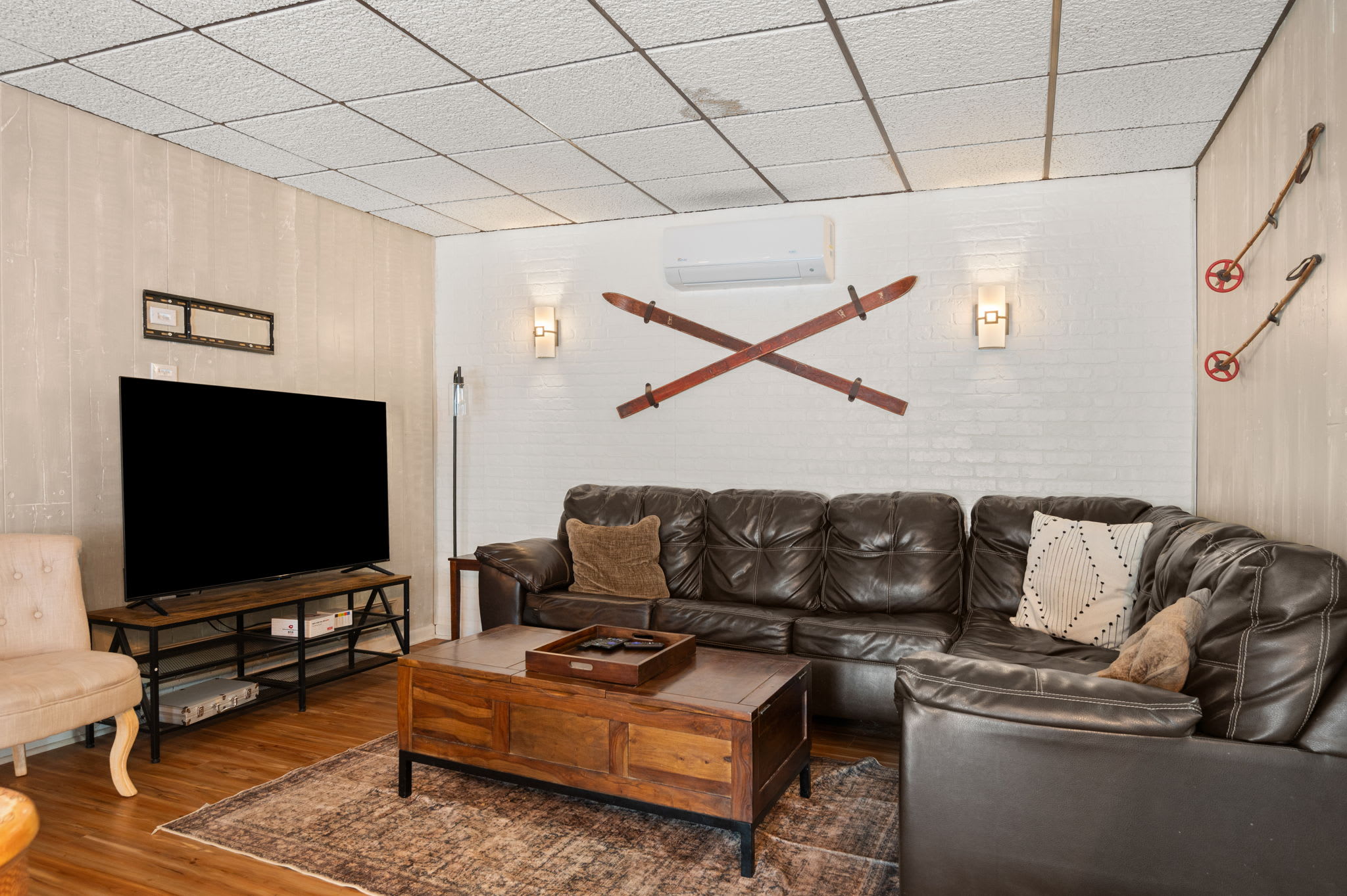 Sink into the leather sofa and catch a movie in the cozy game room lounge