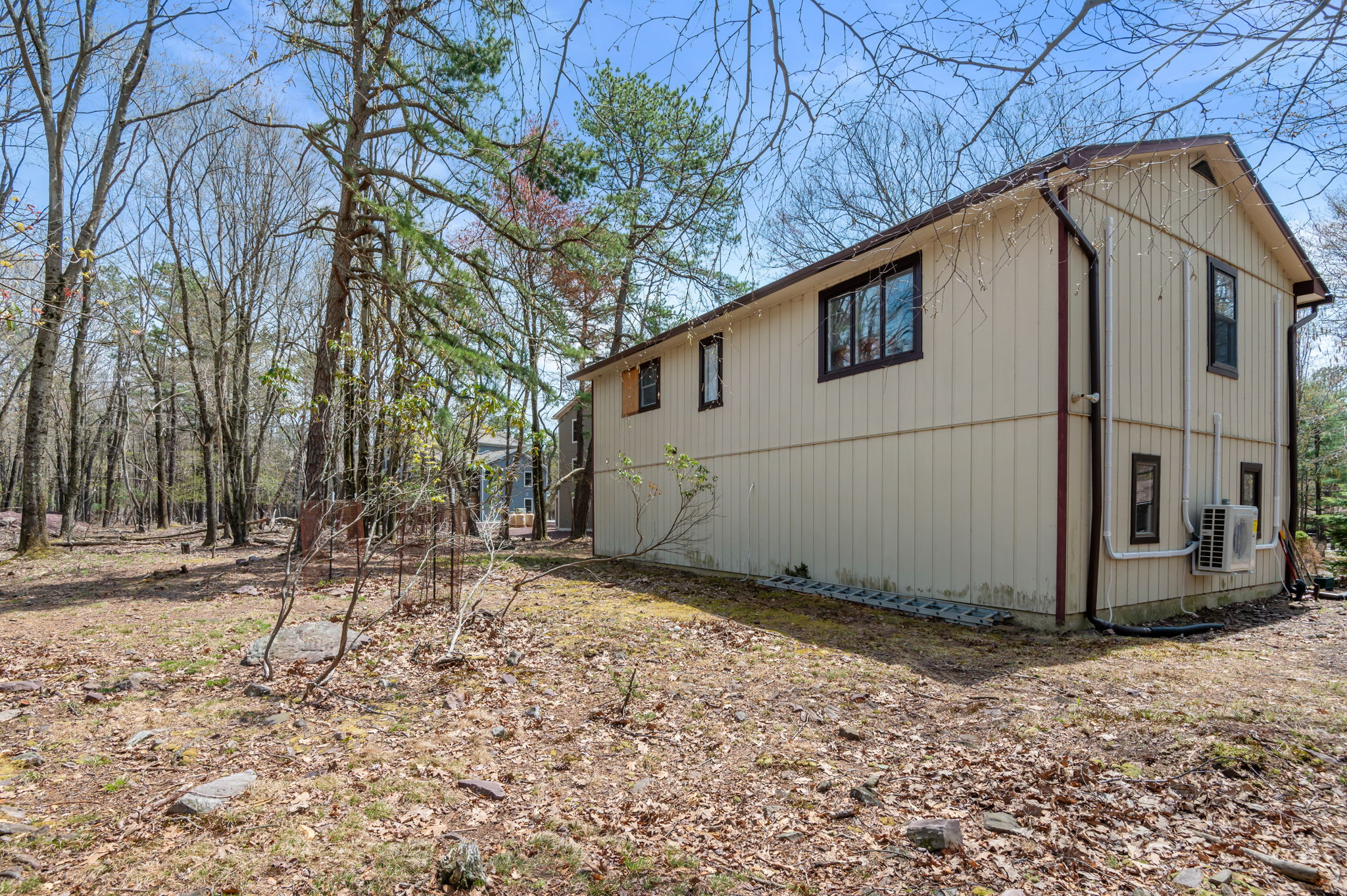 Exterior view showcasing the lodge's setting among Pennsylvania woodland