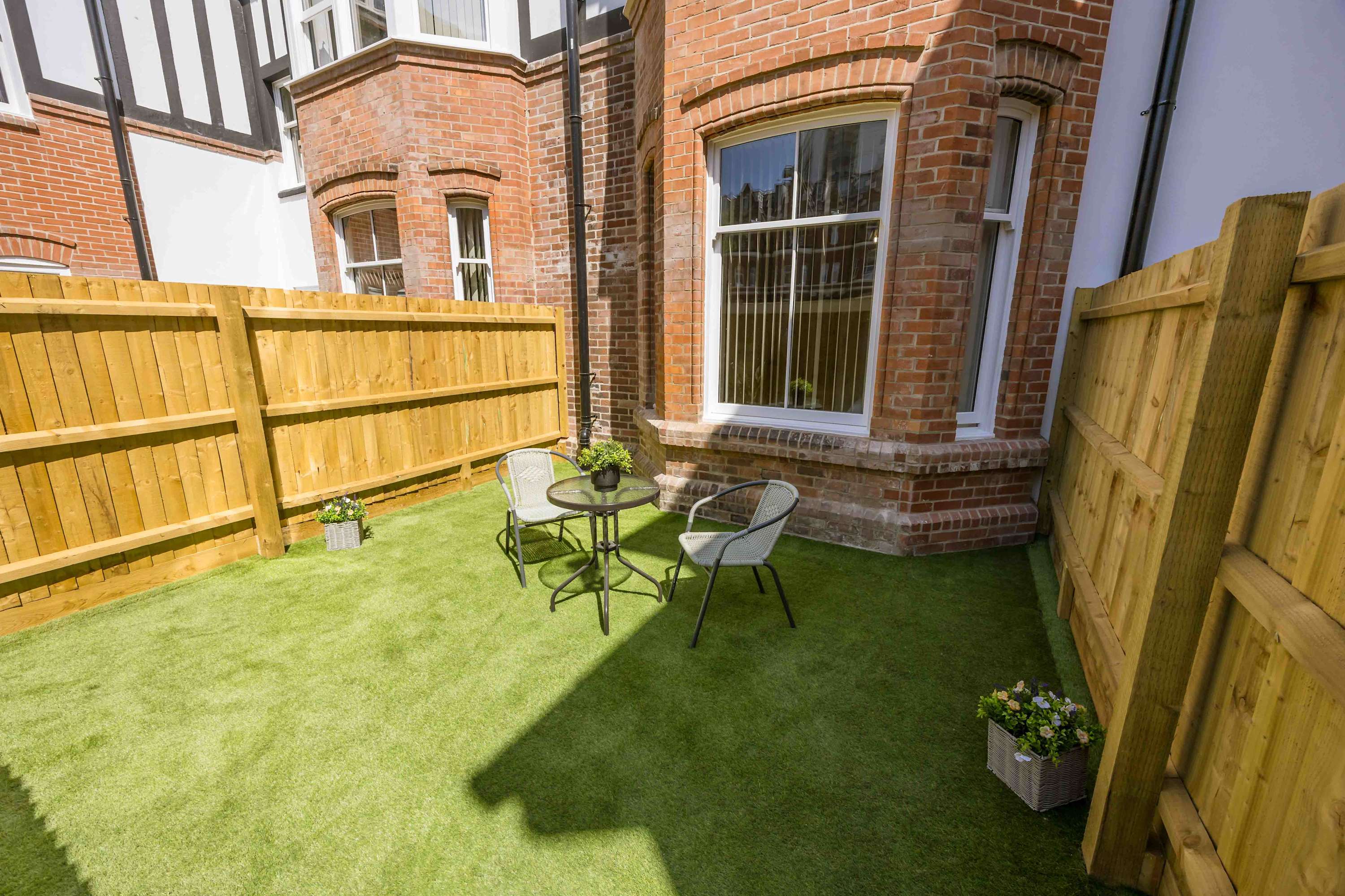 Chic Beachside Escape with Private Garden - Photo 2
