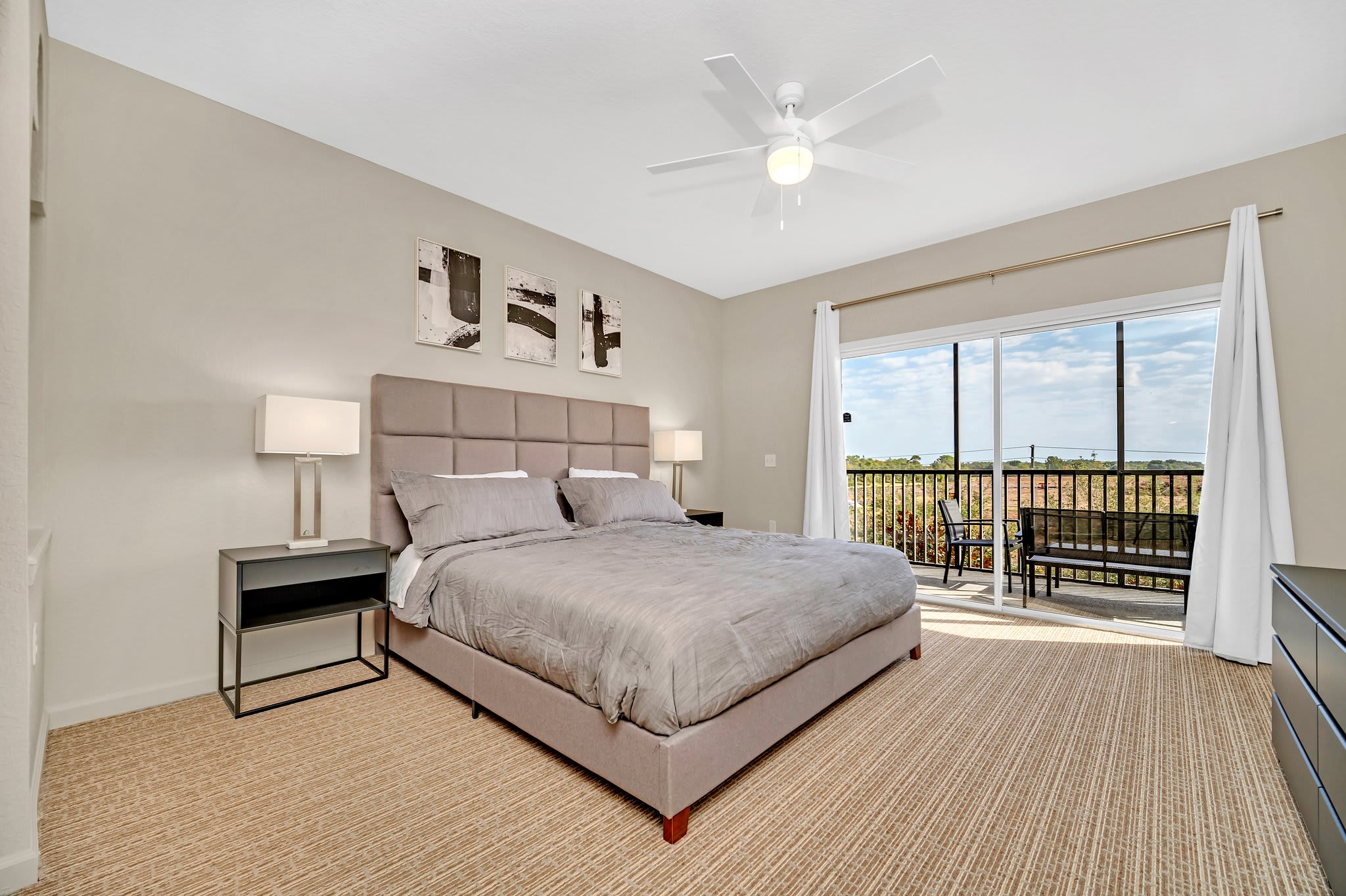 Stylish King bedroom with direct patio access
