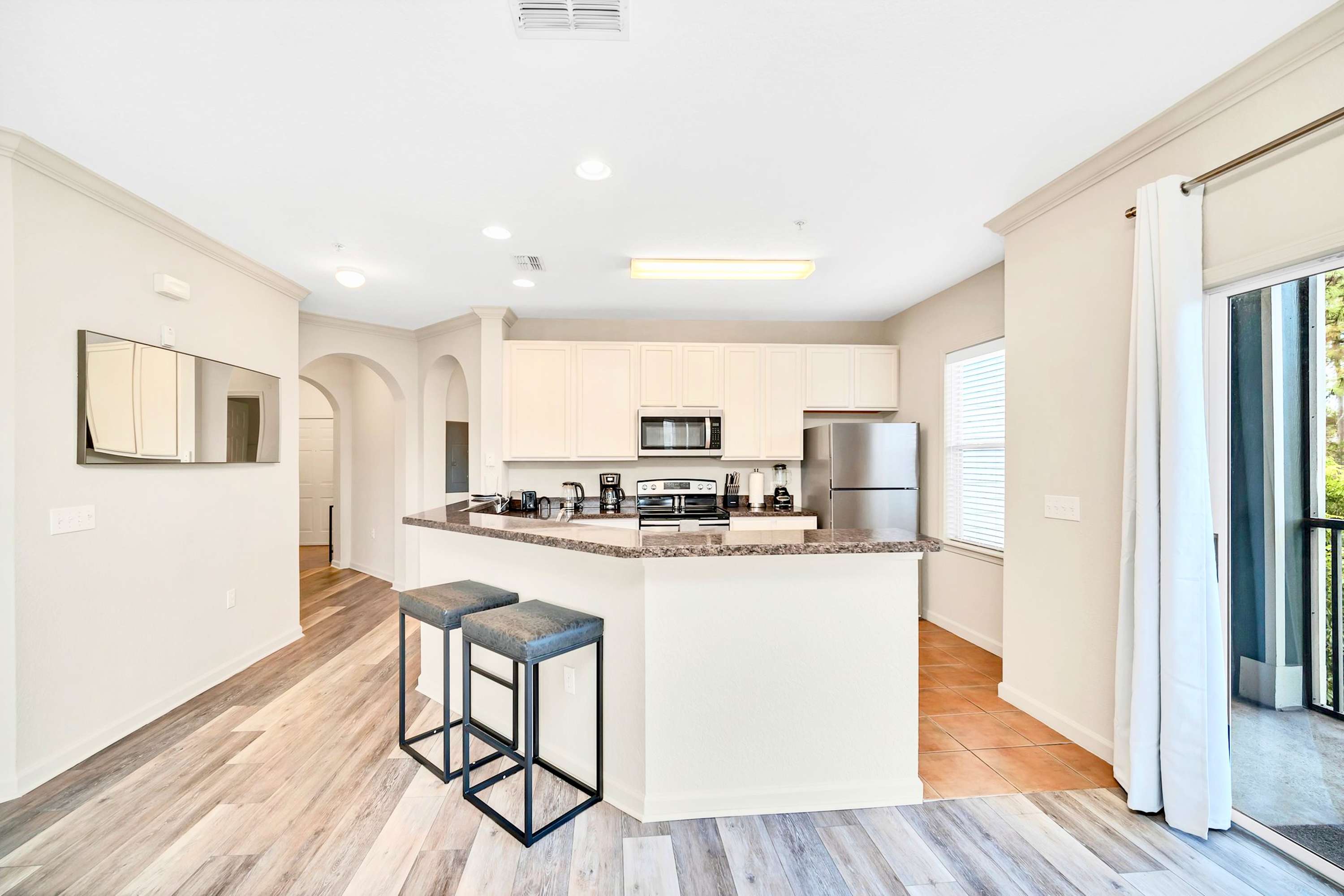 Kitchen area with breakfast bar seating