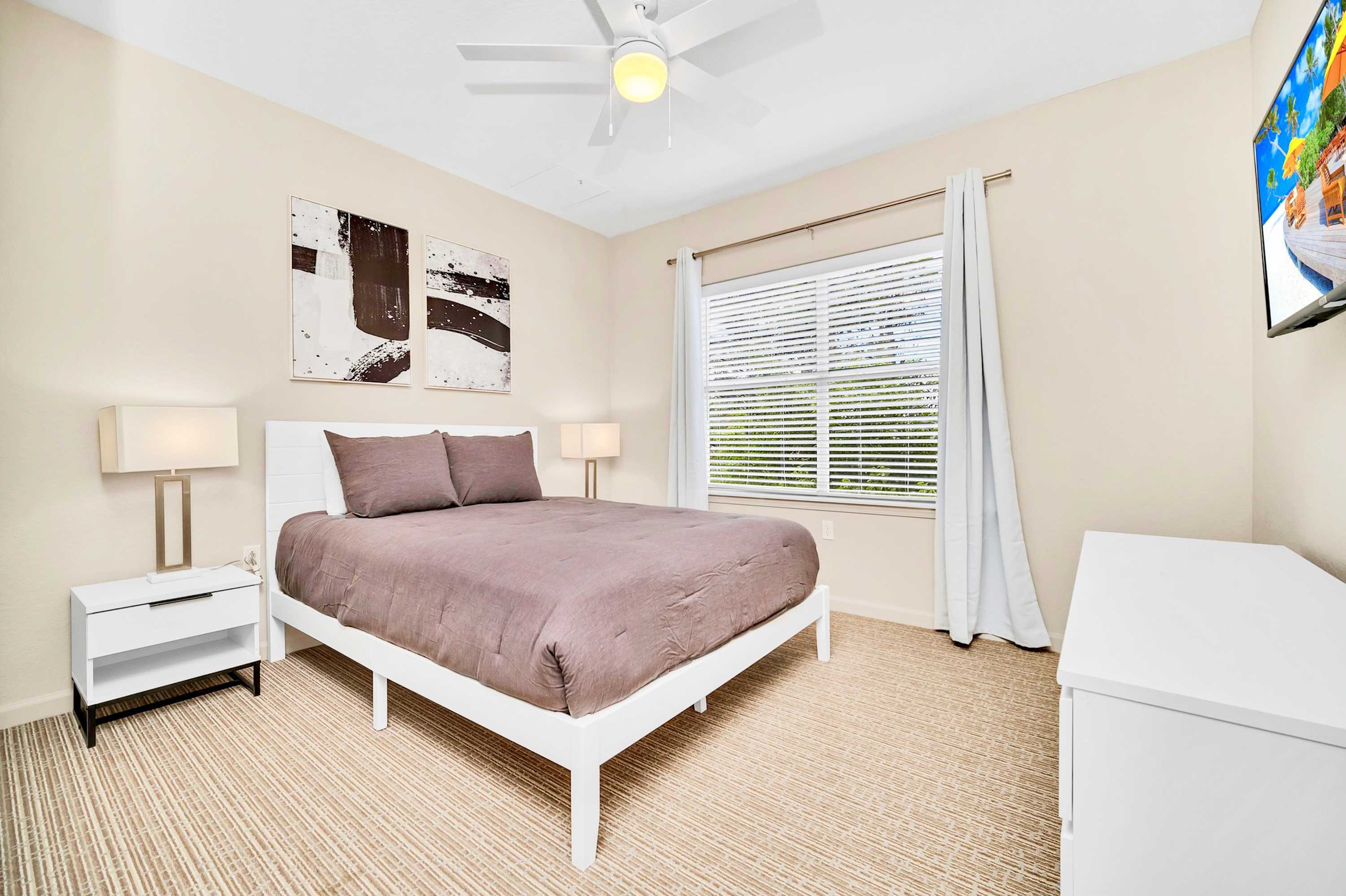 Queen bedroom with smart TV