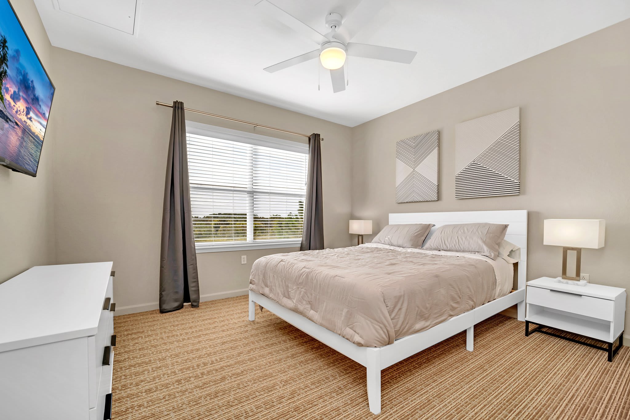 Queen bedroom with smart TV