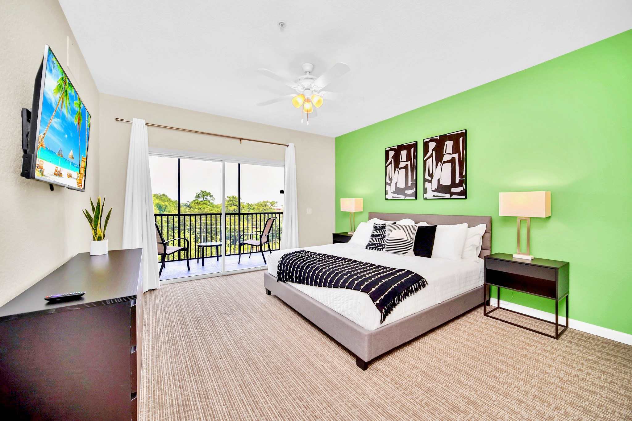 King bedroom with en-suite bathroom and direct patio access