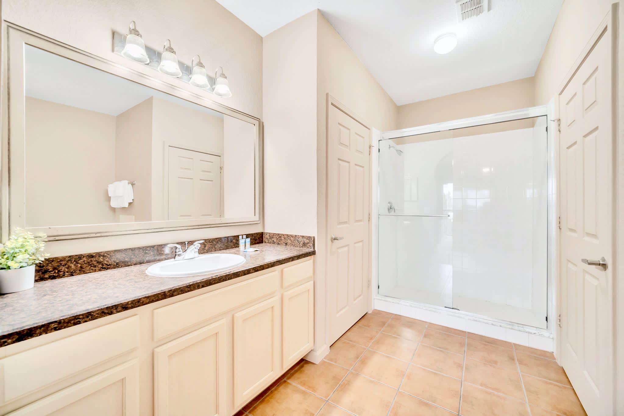 En-suite bathroom with standing shower