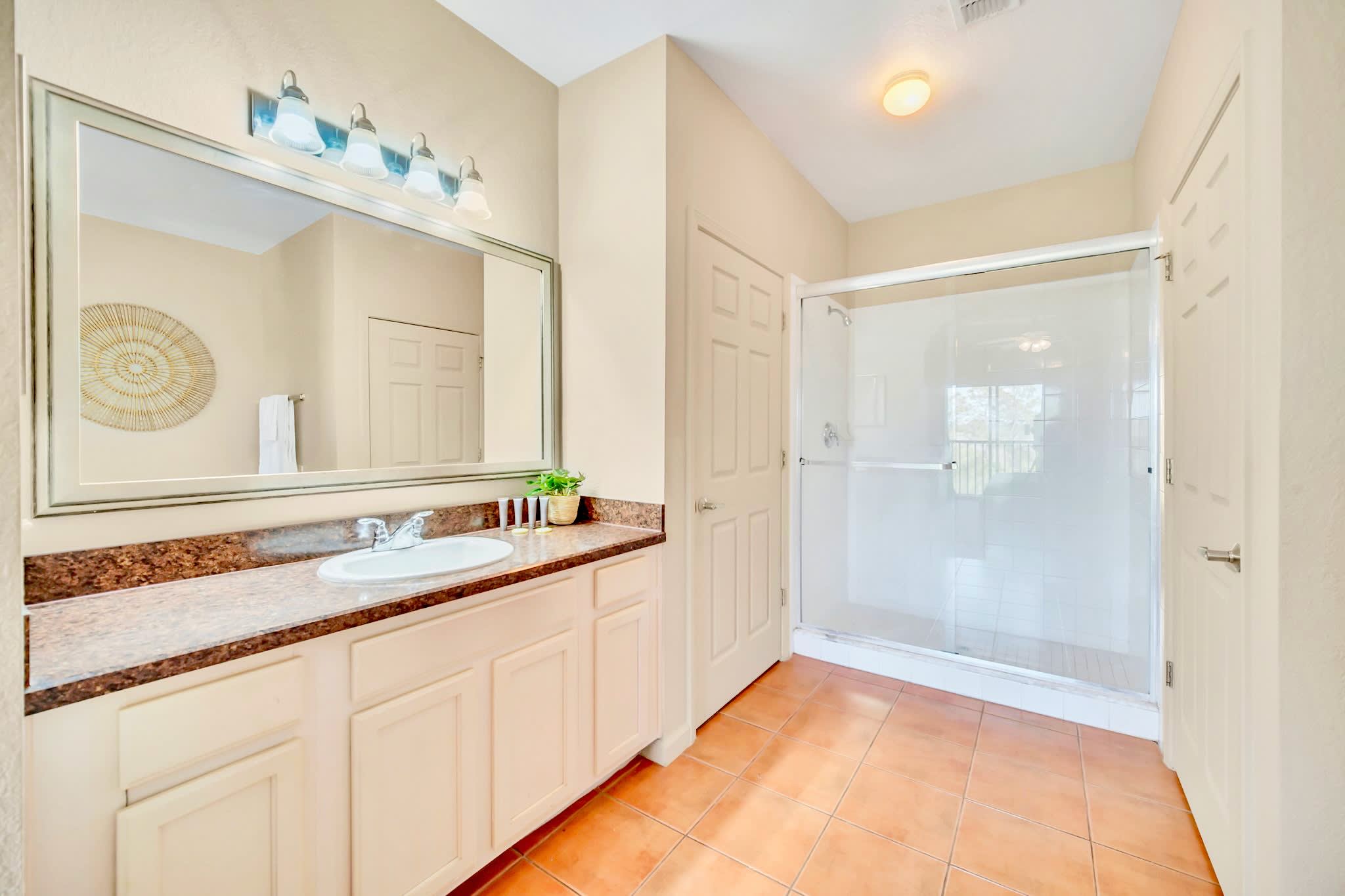 En-suite bathroom standing shower 