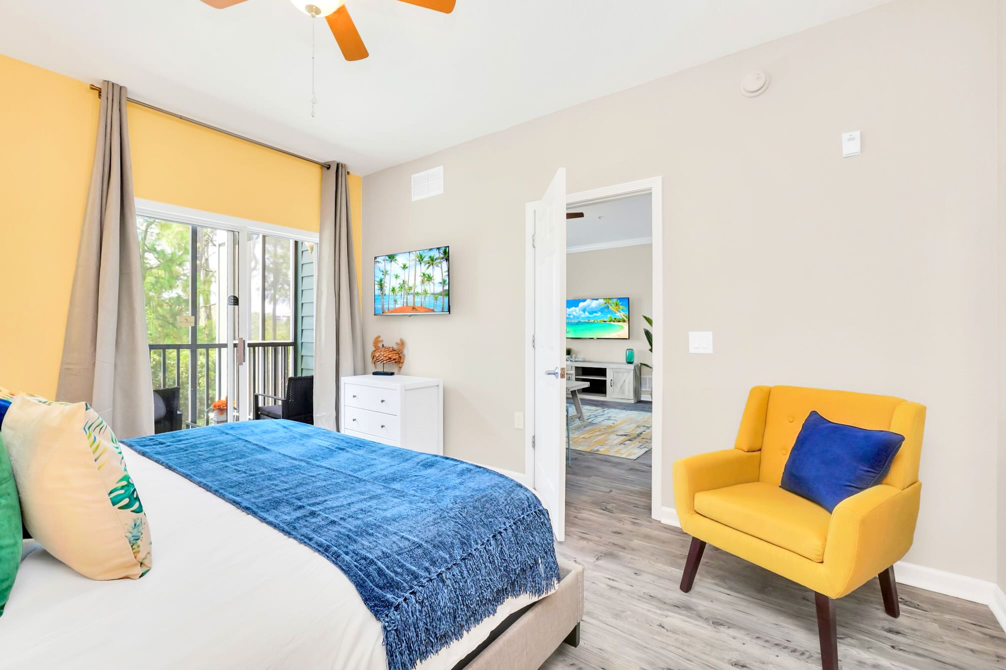 King bedroom with en-suite bathroom and patio access