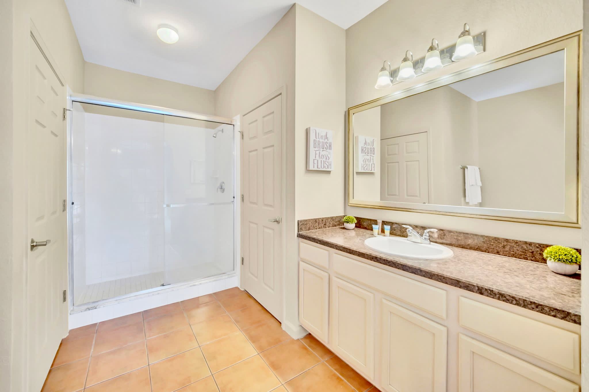 En-suite bathroom with standing shower