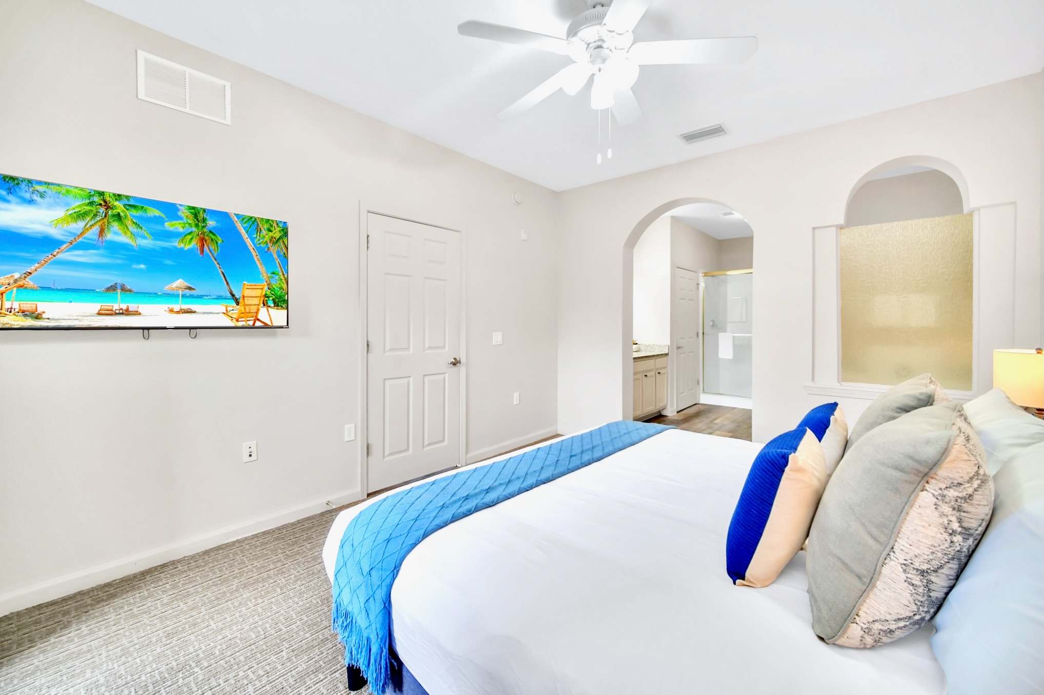 King bedroom with en-suite bathroom and smart TV