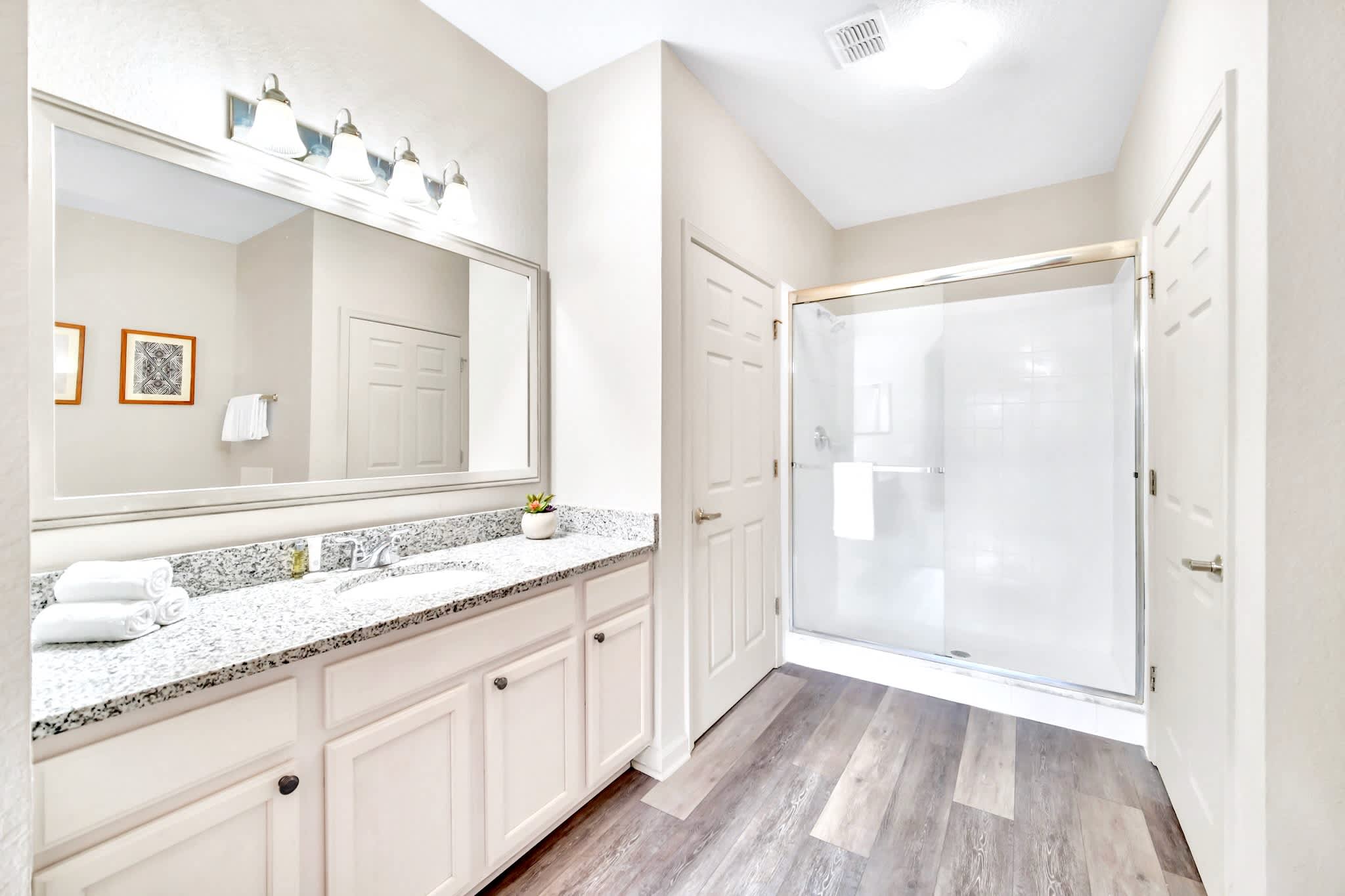 En-suite bathroom with standing shower