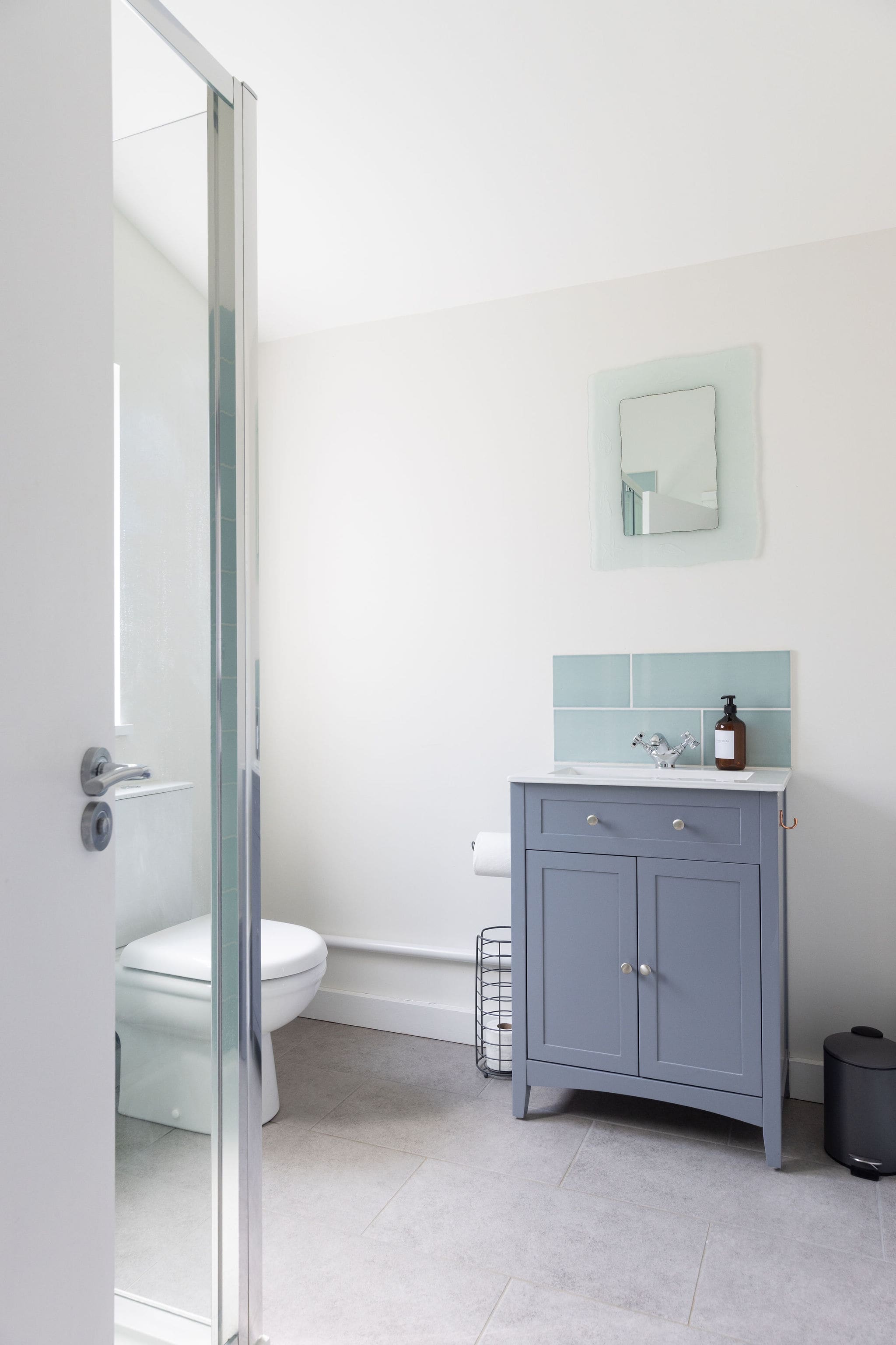 Modern bathroom with soft tones and light