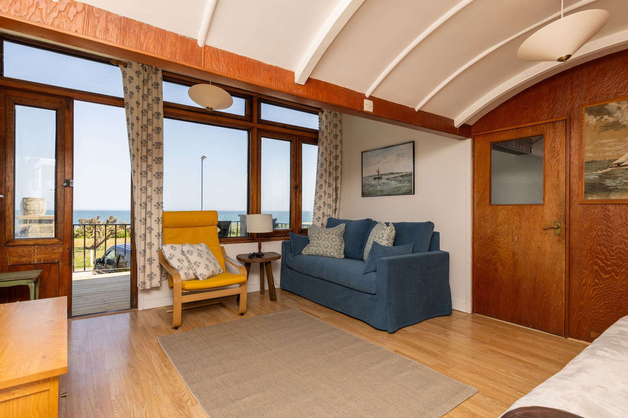 Original carriage windows with sea views