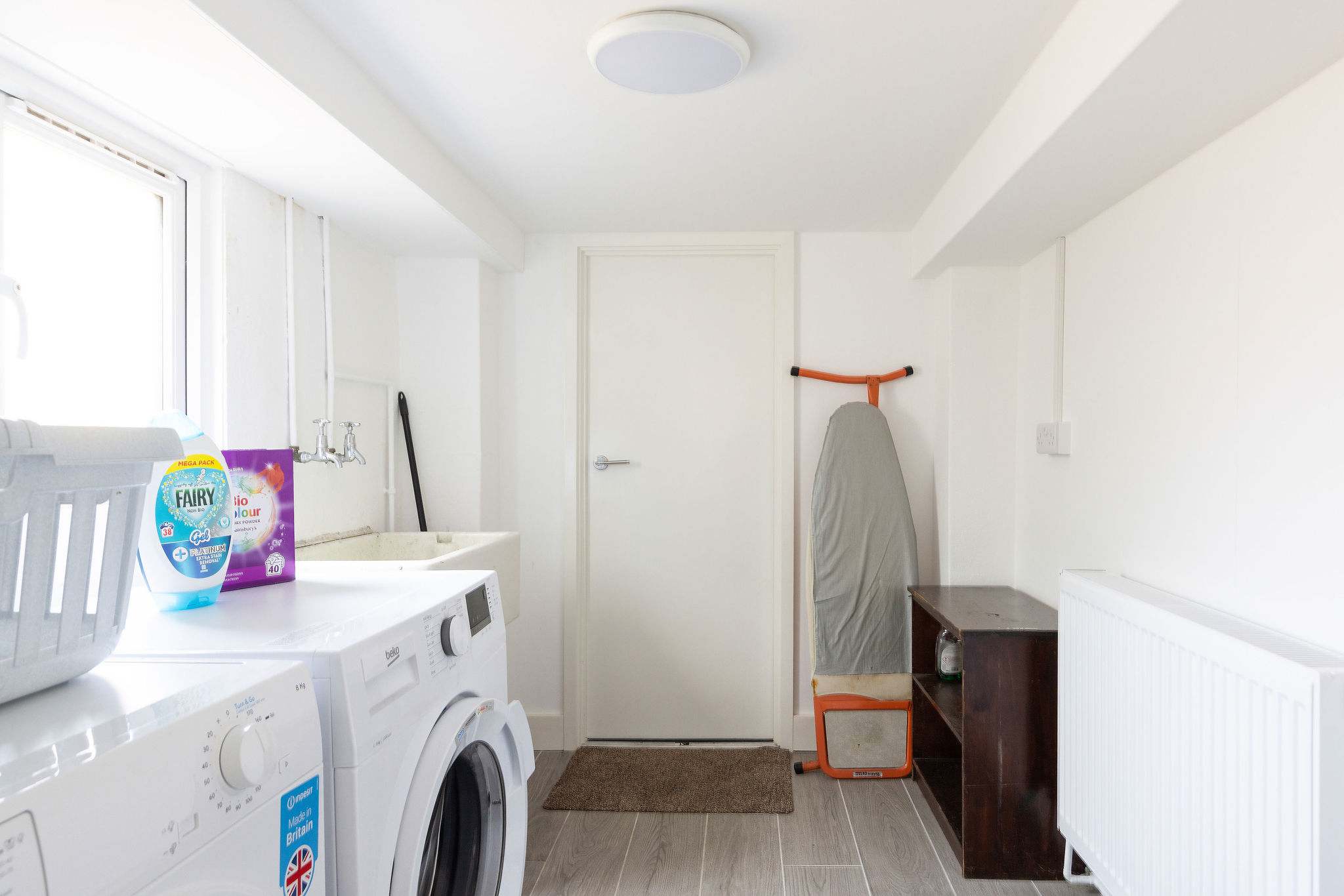 Laundry room with washer