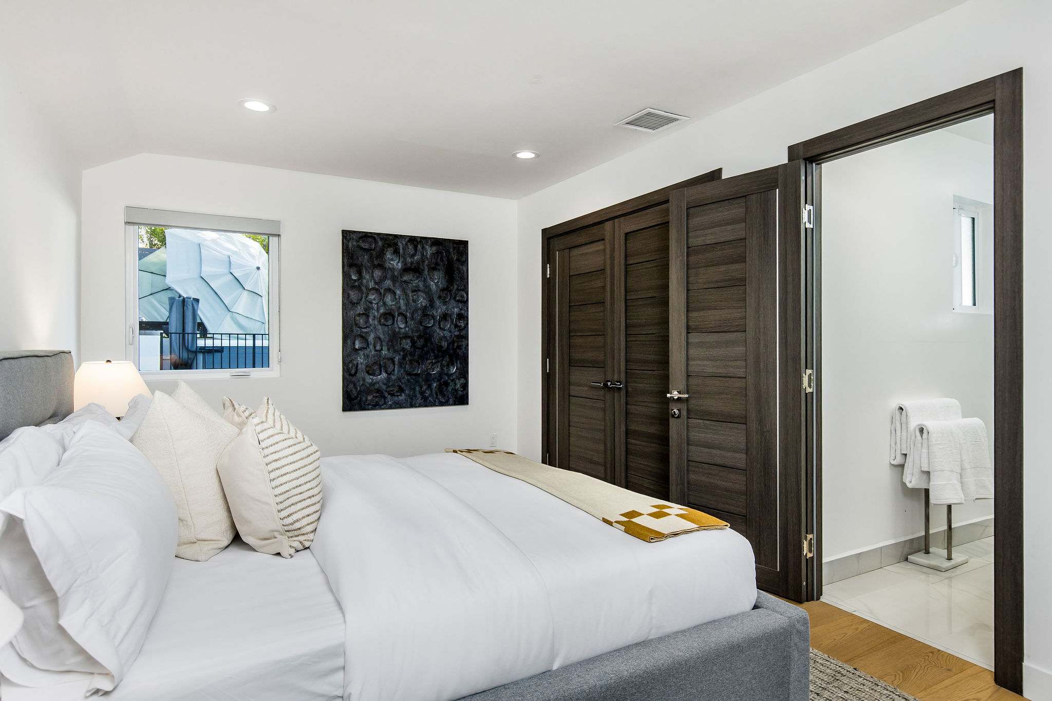 Bed dressed in premium cotton with a matte washed finish