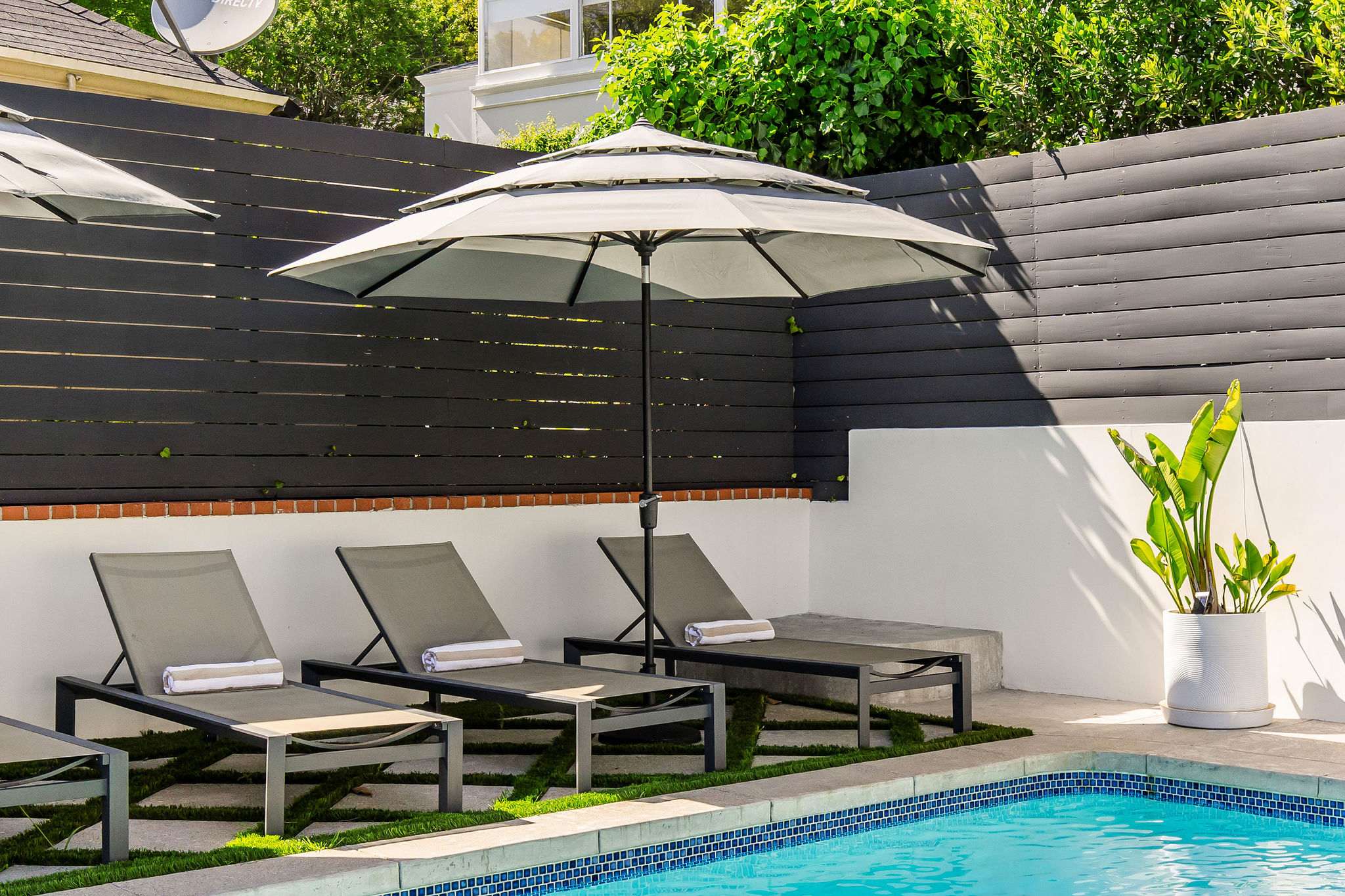 A backyard built for sunshine, swims, and good company