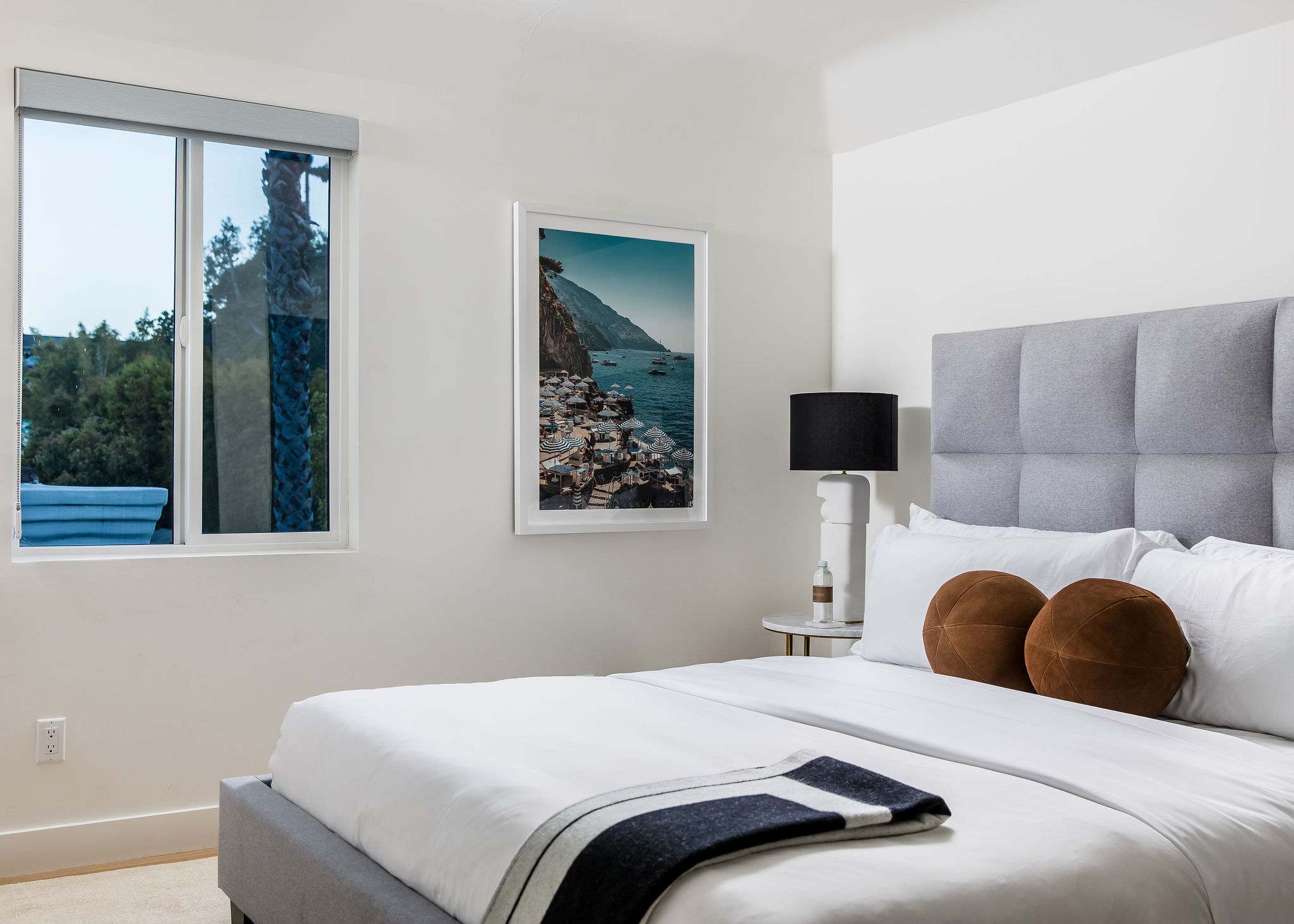 Wrapped in crisp hotel-grade linens and layered textures
