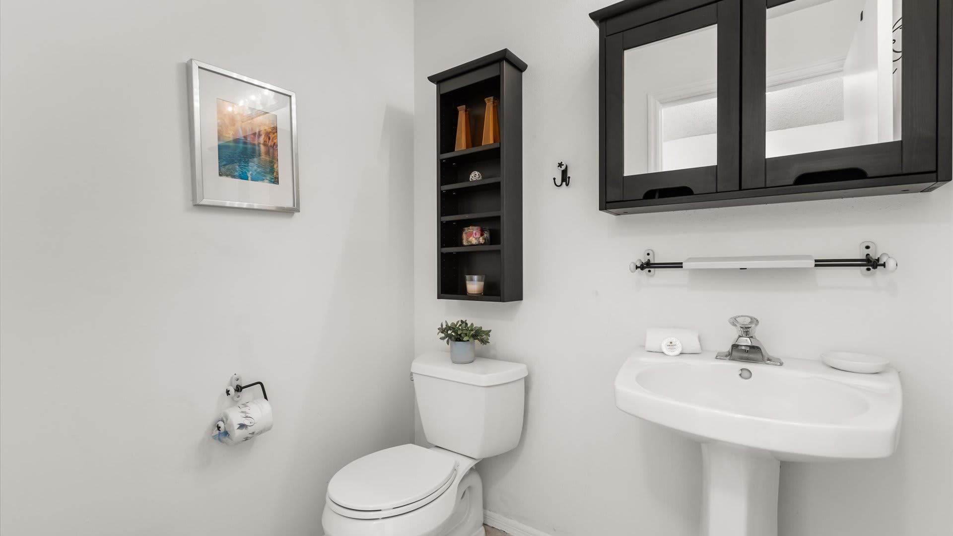 Hal bathroom with toilet and wash basin