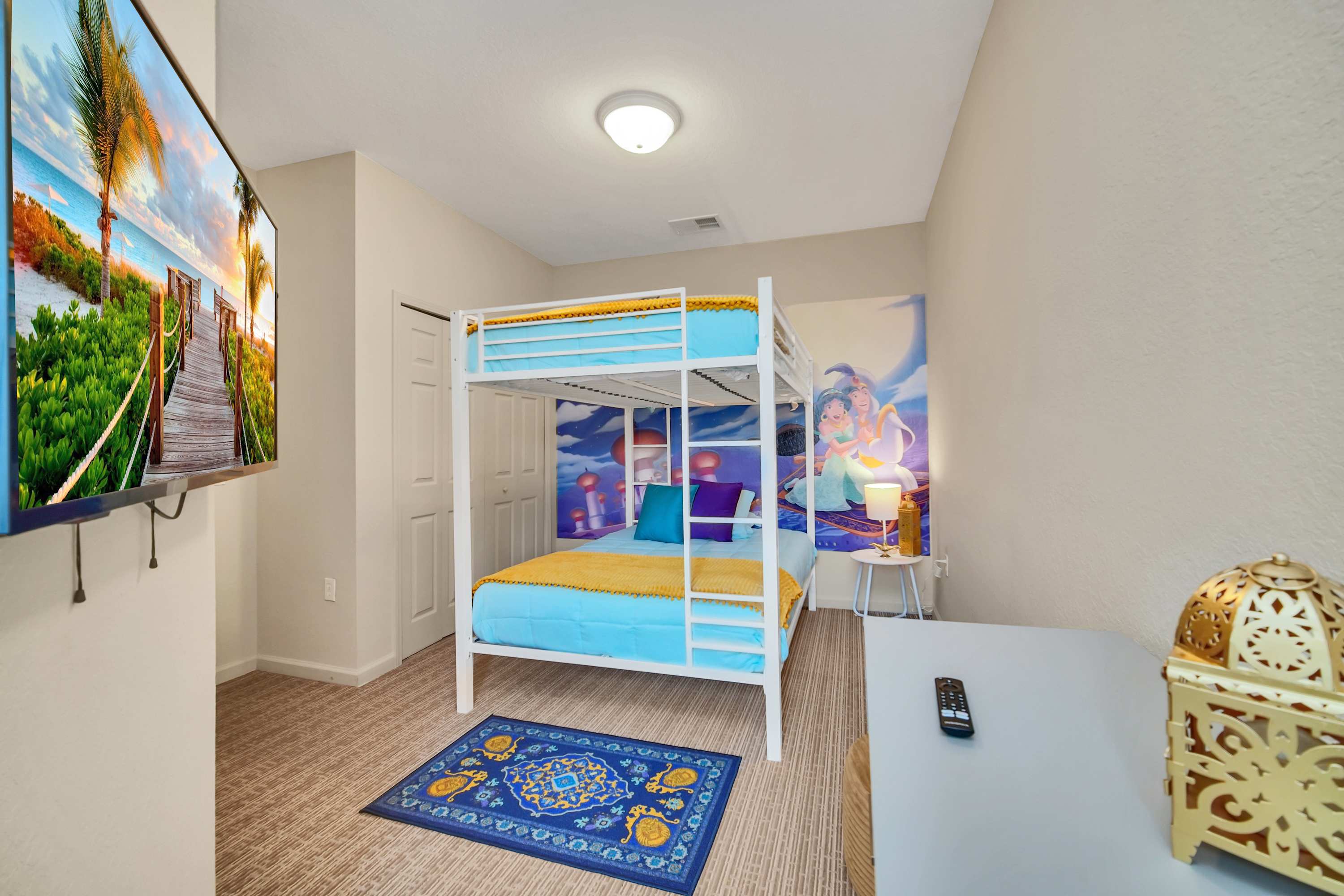 Themed bunk bedroom with smart TV