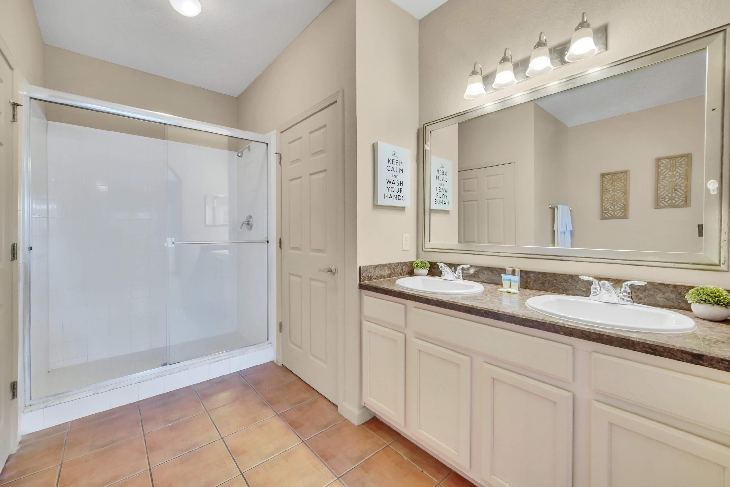 En-suite bathroom with spacious shower and double vanity