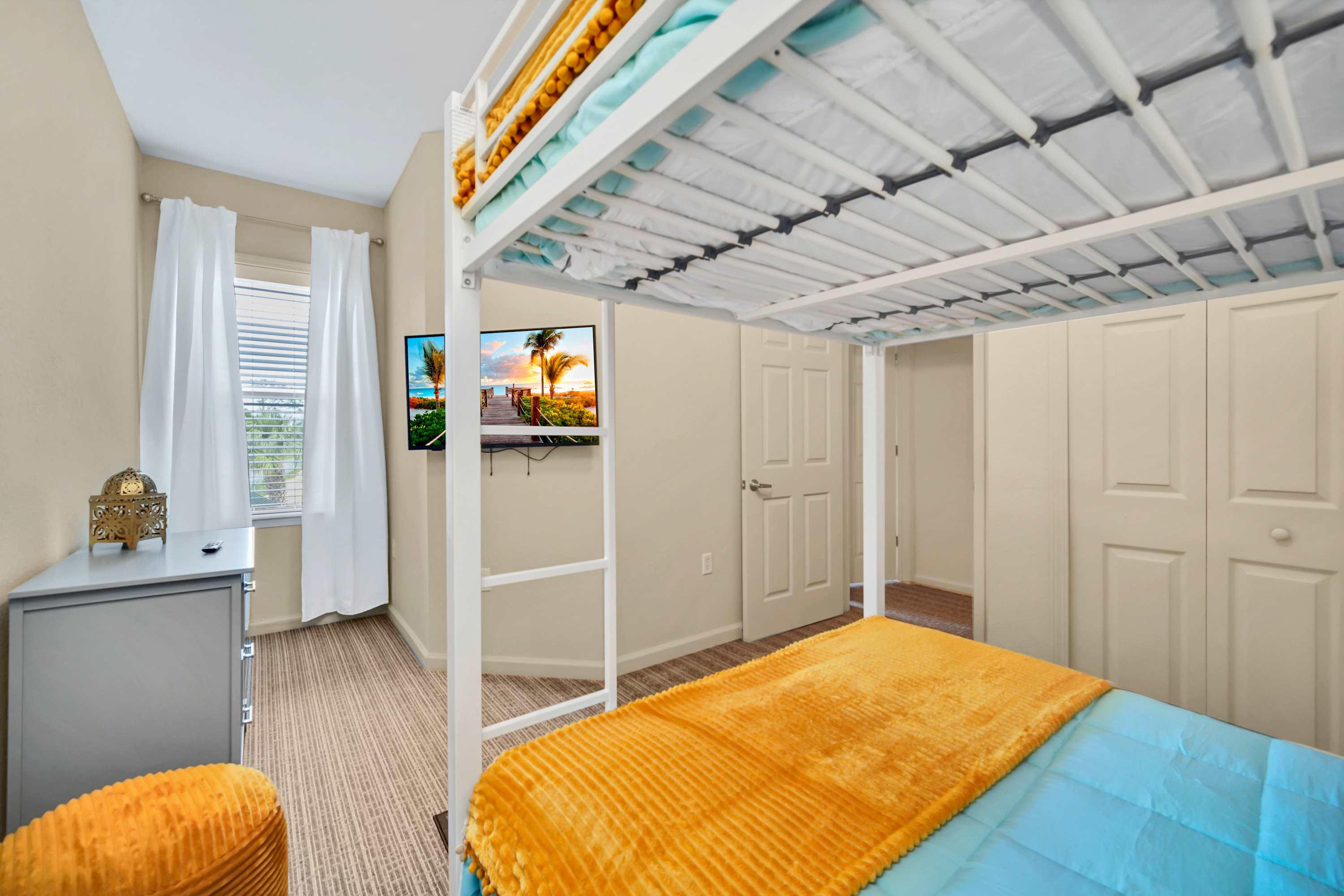 Bunk bedroom with smart TV