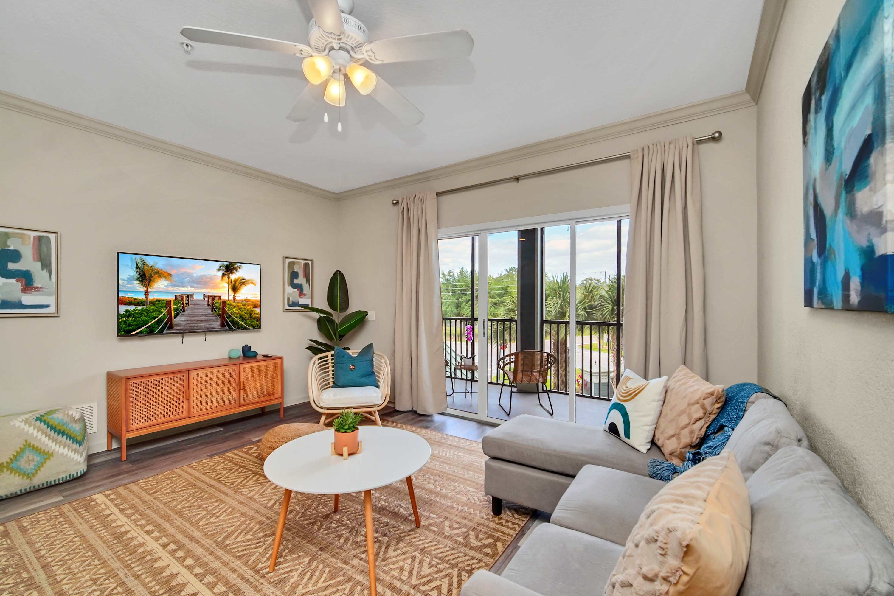 Modern living room with outdoor patio access and smart TV