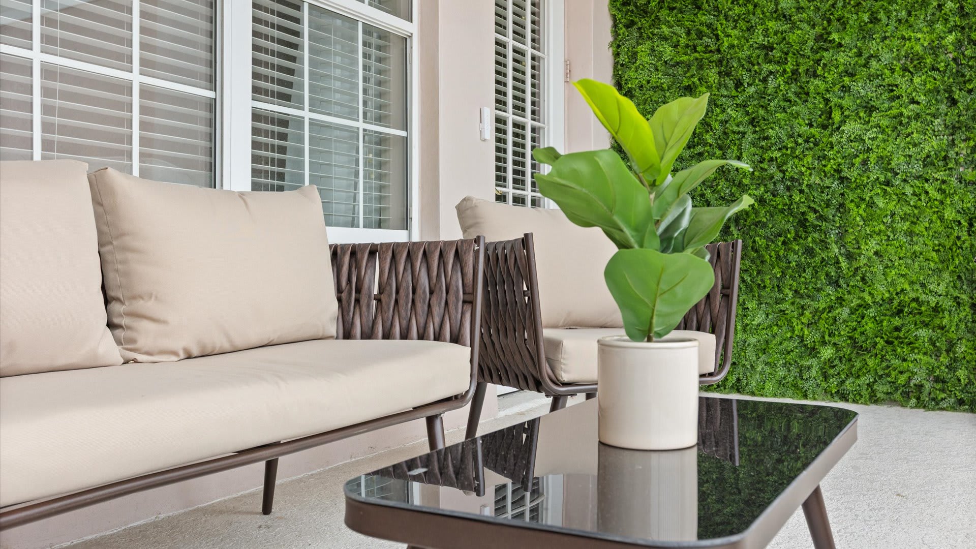 Private outdoor balcony with dining area