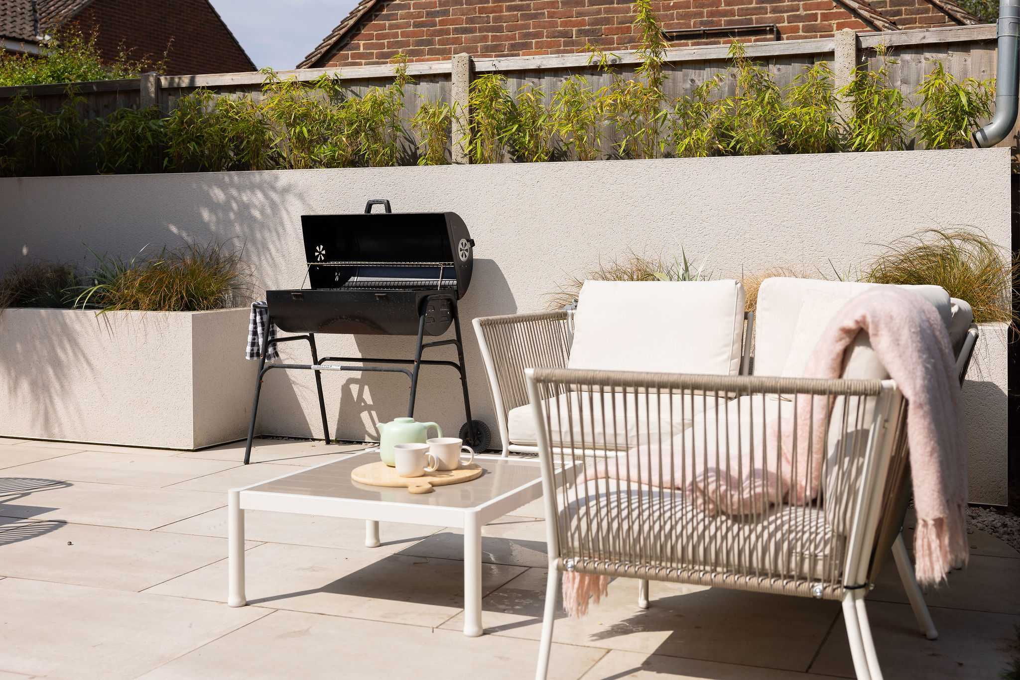 Relax in this little sun trap on our lovely outside sofa