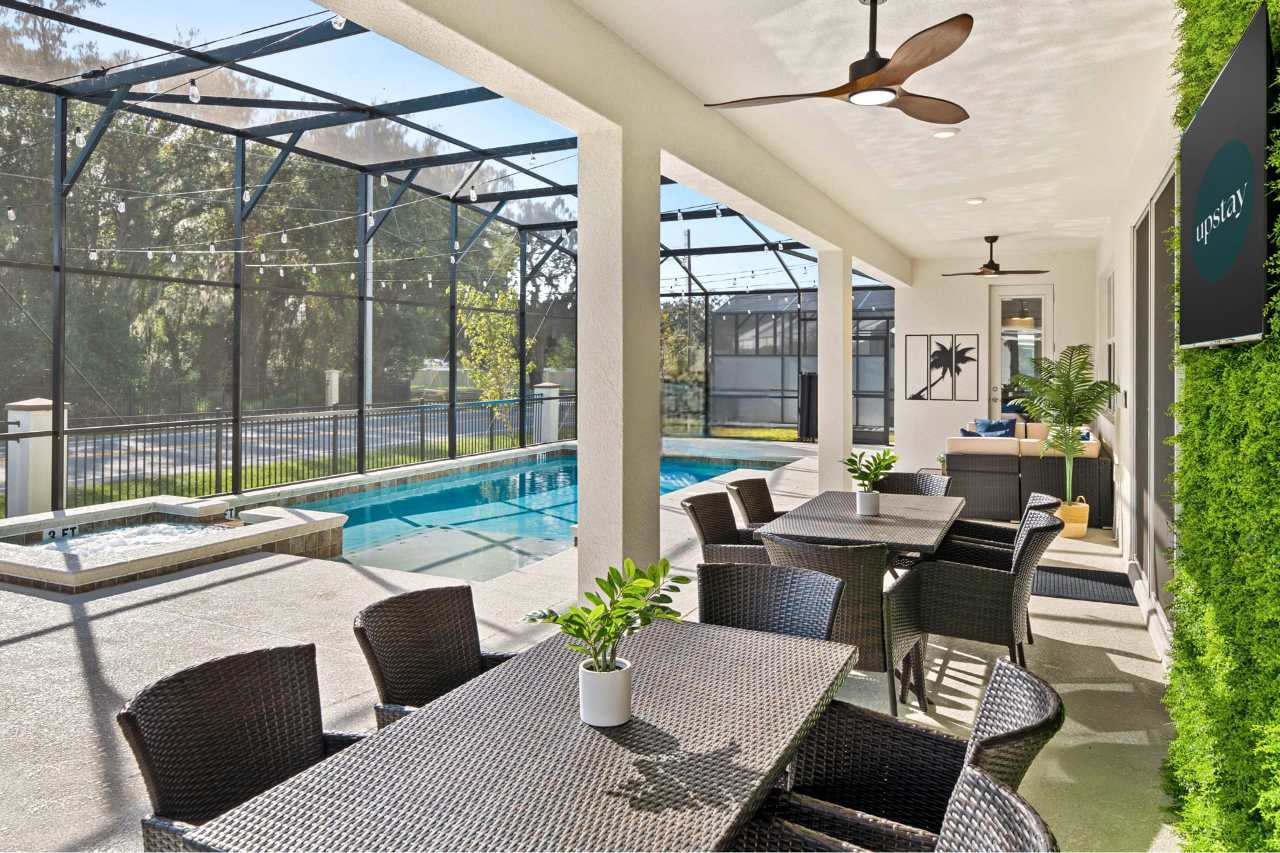 Poolside Dining Area with Wall Mounted TVs
