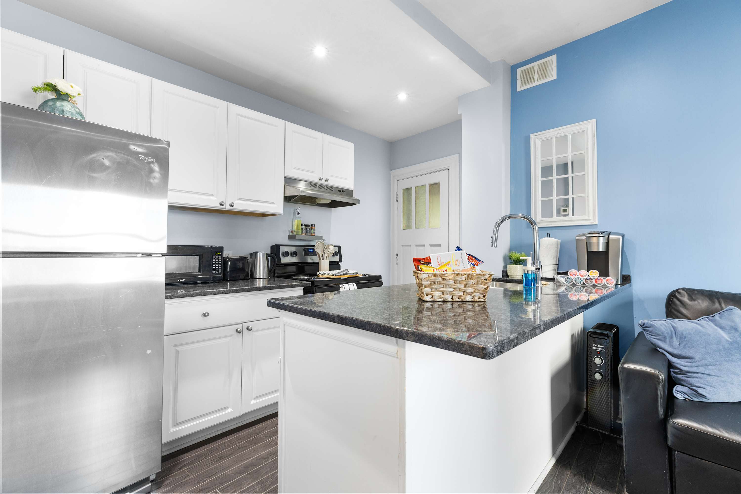 Fully equipped kitchen with centered counter area