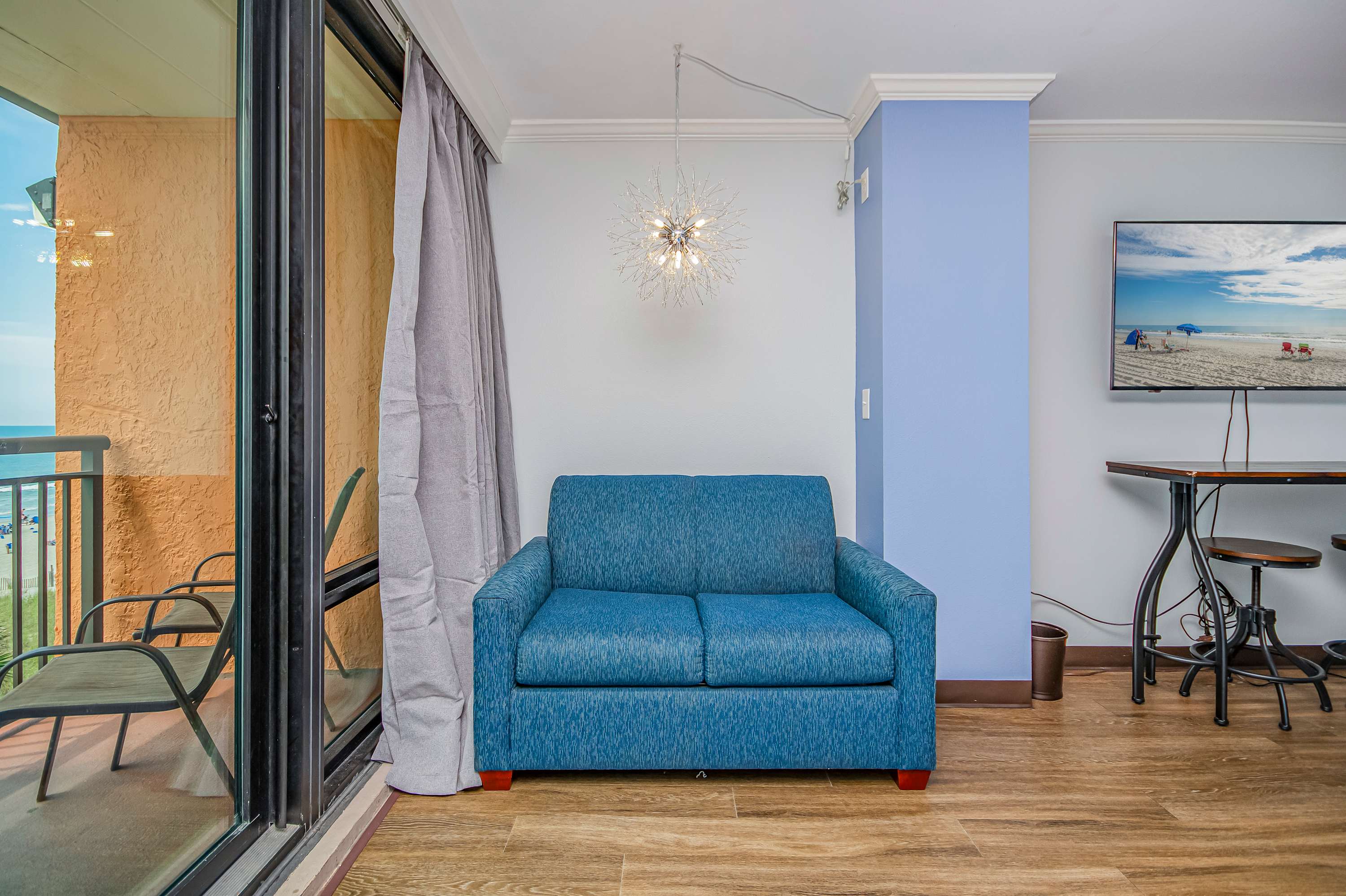 Bright and beachy with comfy seating for the whole crew.