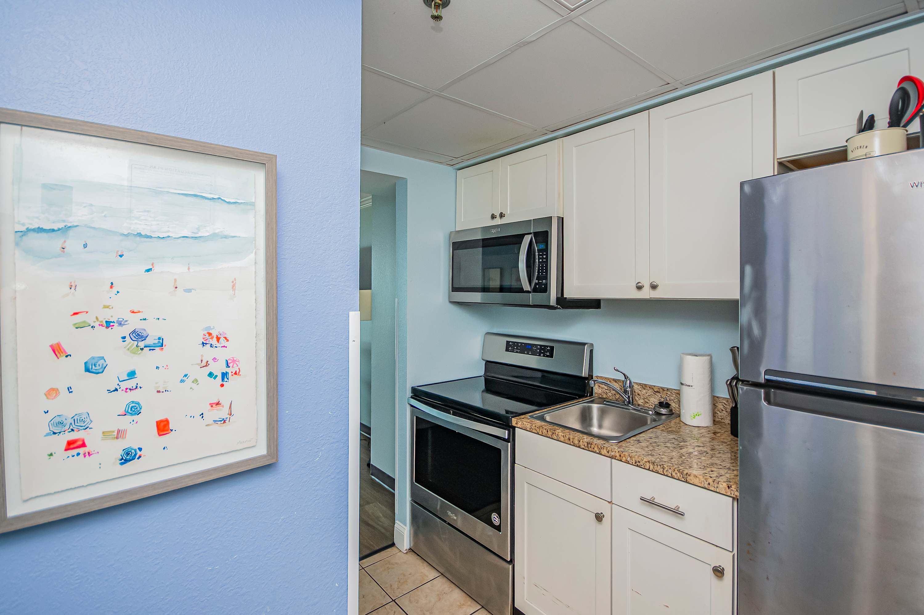 Whip up breakfast with ease in this bright and modern Myrtle Beach kitchen