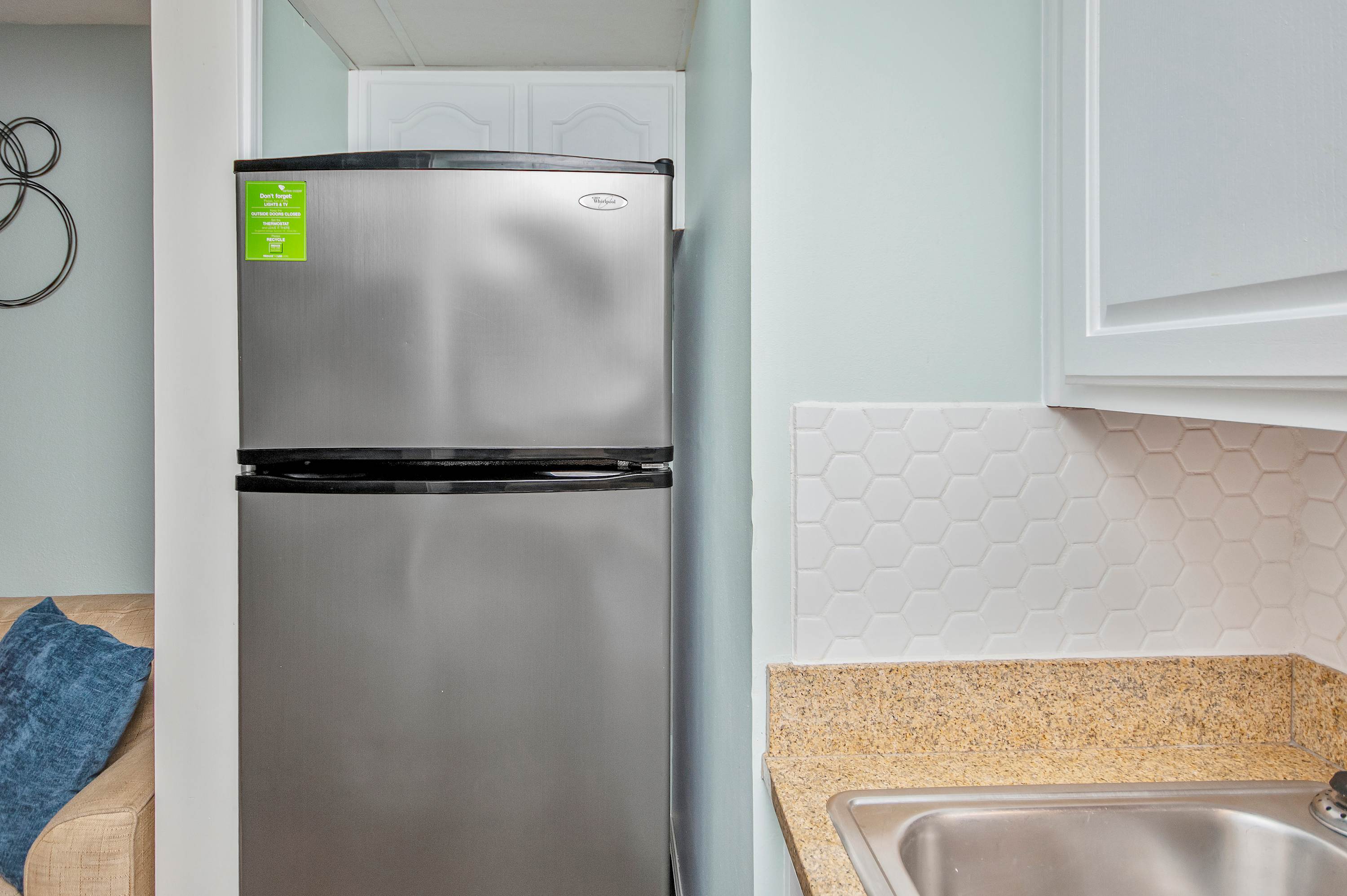 Fully stocked kitchen with everything you need for home-cooked meals by the beach.