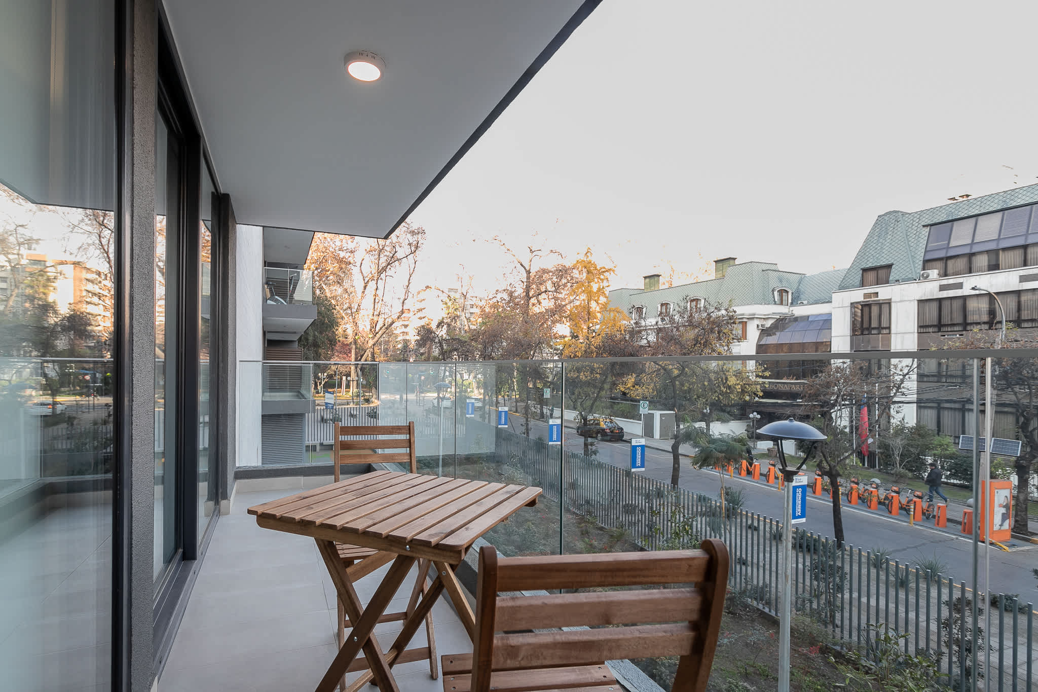 Enjoy your morning coffee on this private balcony with a charming city view.