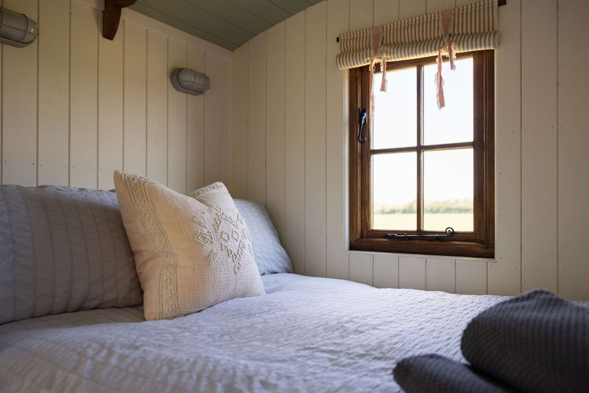 Cosy up in the comfortable bed, enjoying unspoilt countryside views after a day of exploring