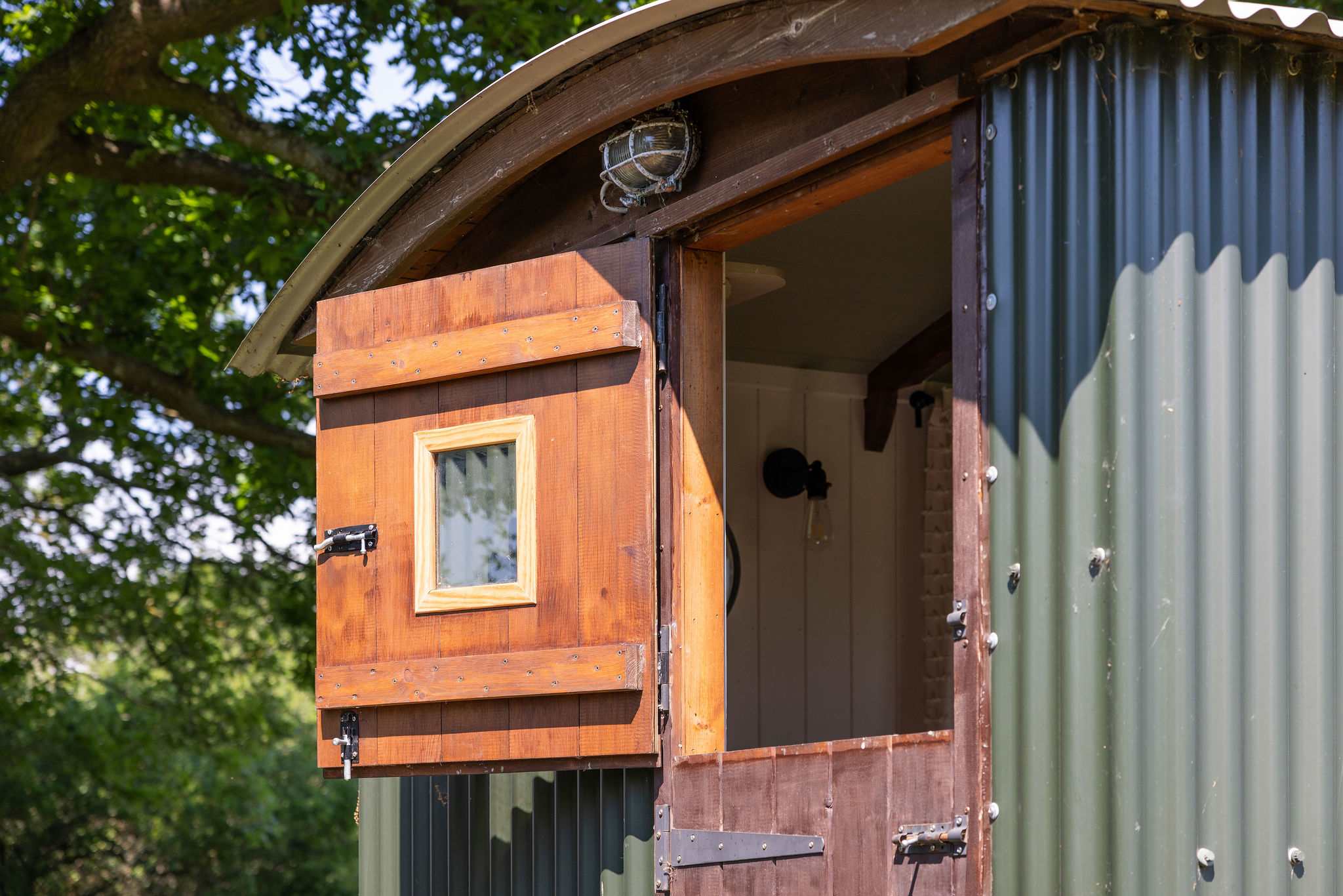 Swing open the barn style door and welcome the fresh air