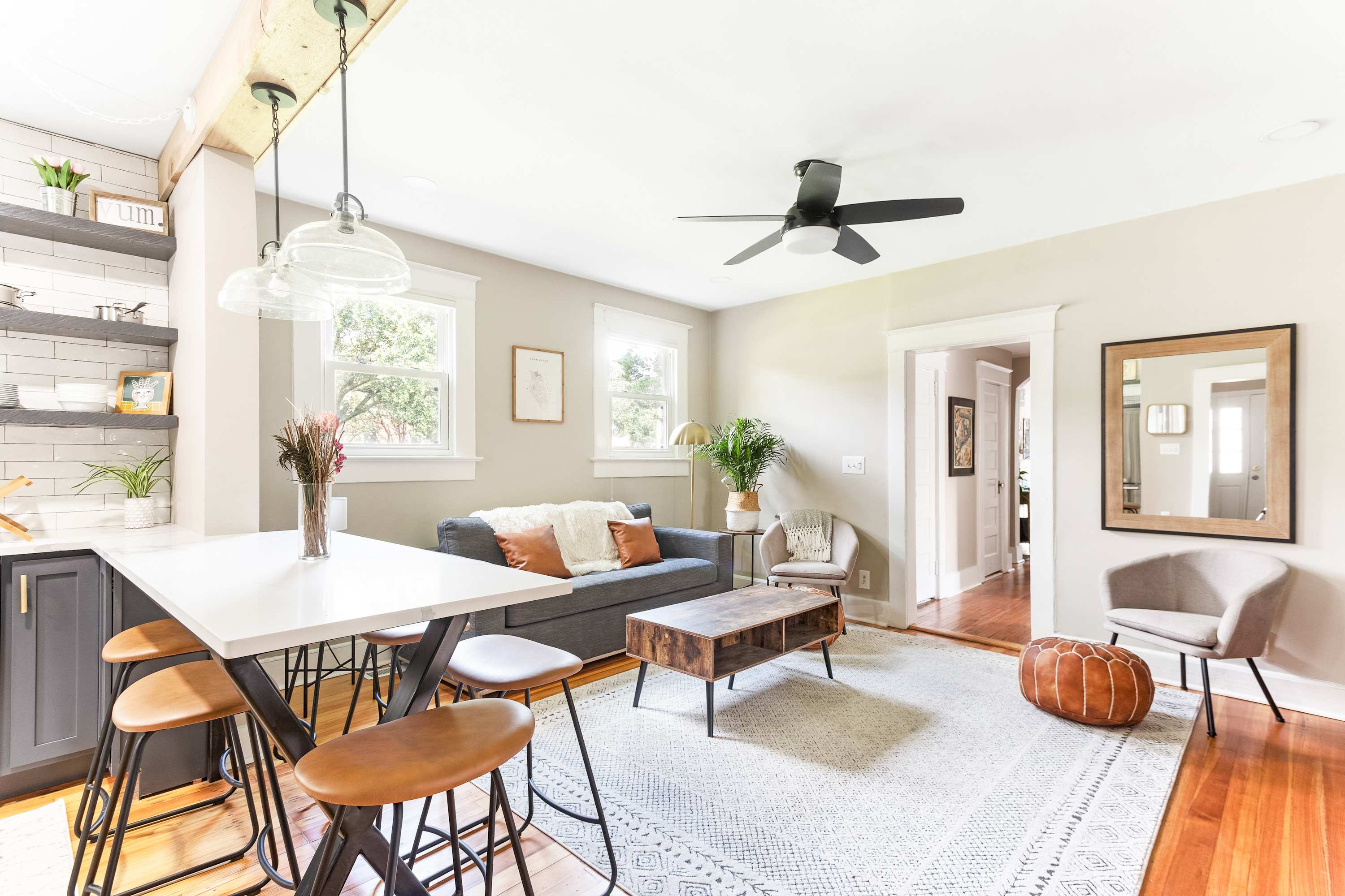 Spacious living room with plenty of seating for your group! Dining seating for 6!