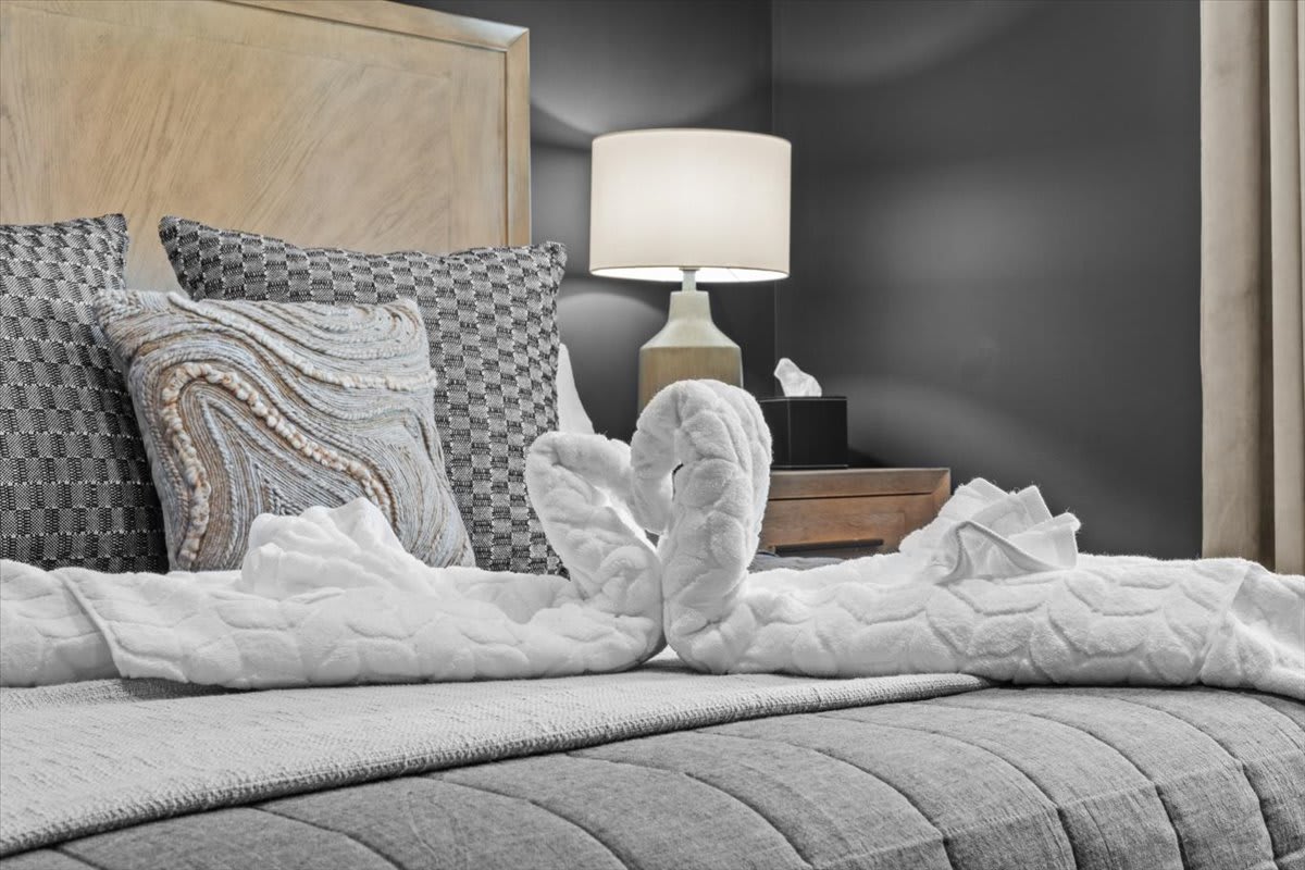 The third bedroom offers a king bed and toddler bed, perfect for families with young children.