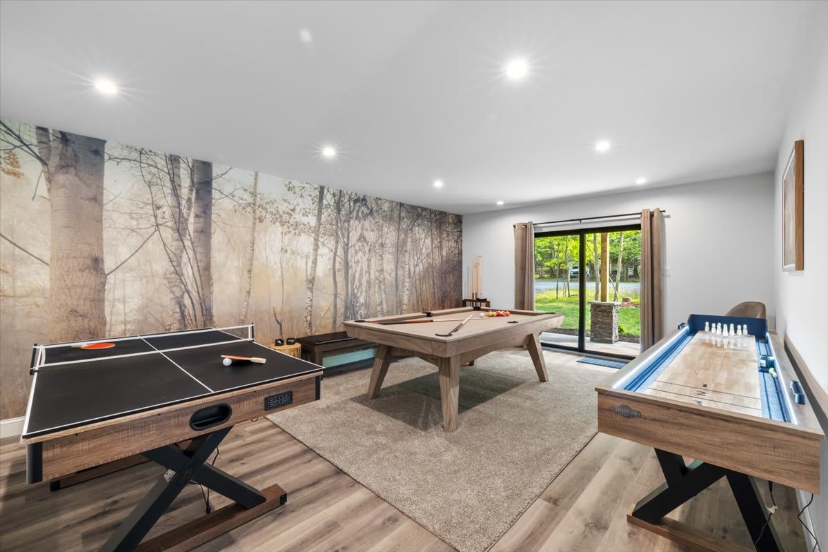 The game room invites hours of fun with pool, ping pong, and shuffleboard.