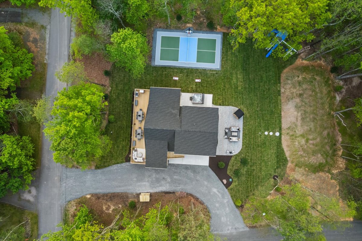 Bird's-eye view of this stunning Poconos retreat tucked among the trees.