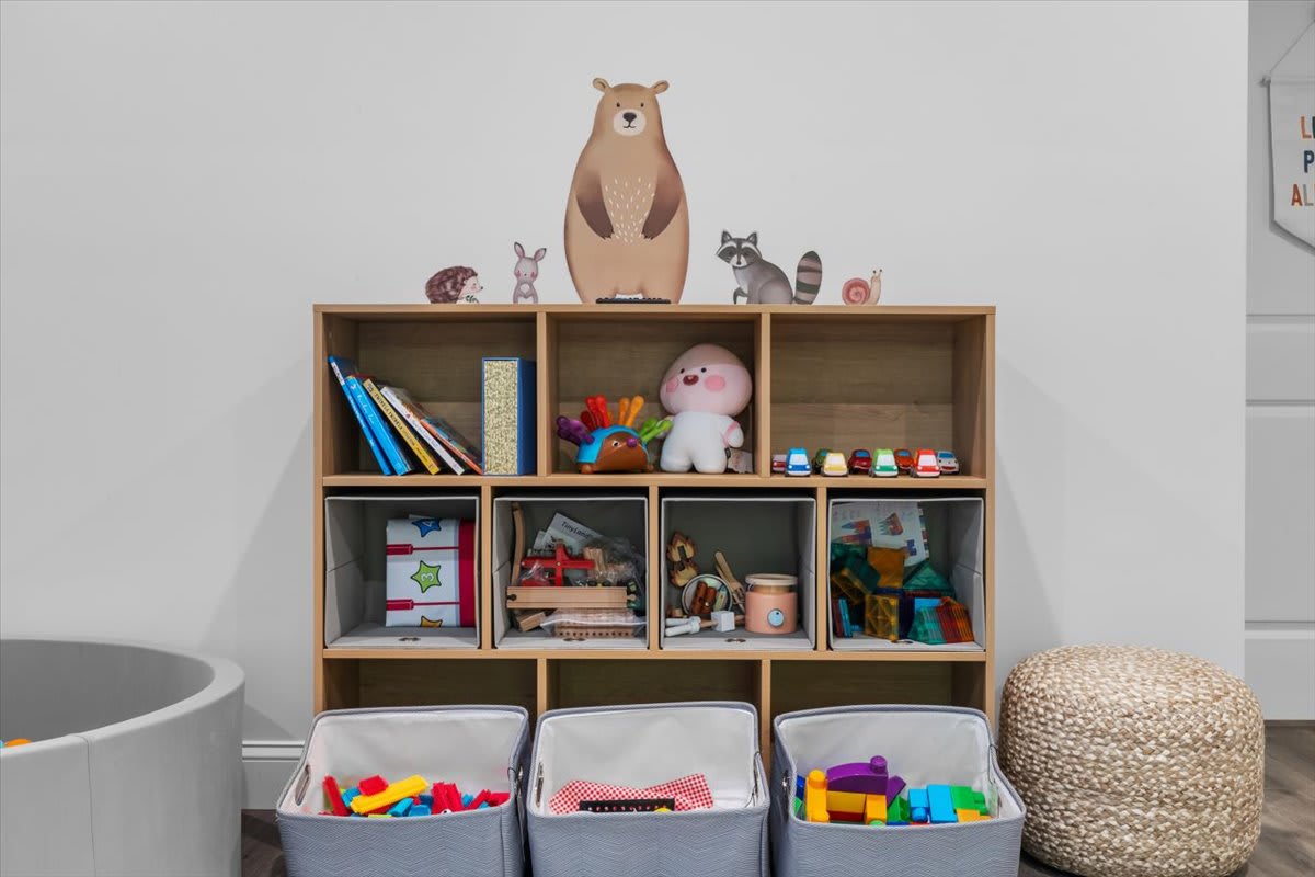 Little ones will find endless entertainment with the well-stocked toy storage and play area.