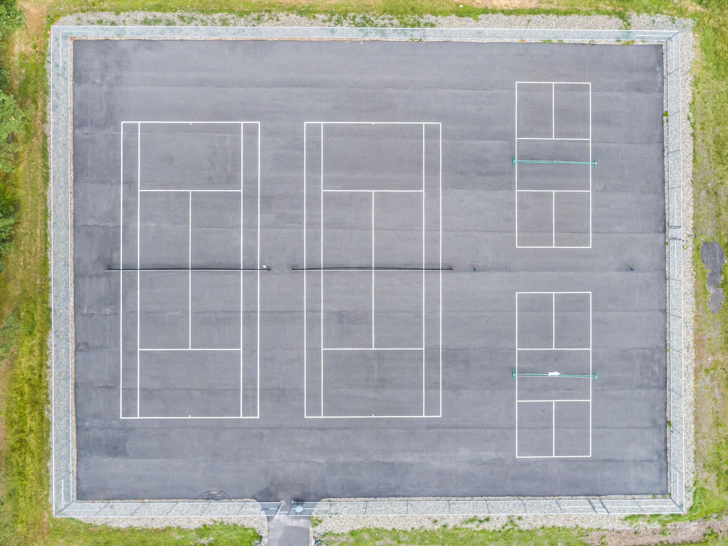 Challenge friends and family to a match on the community pickleball courts.