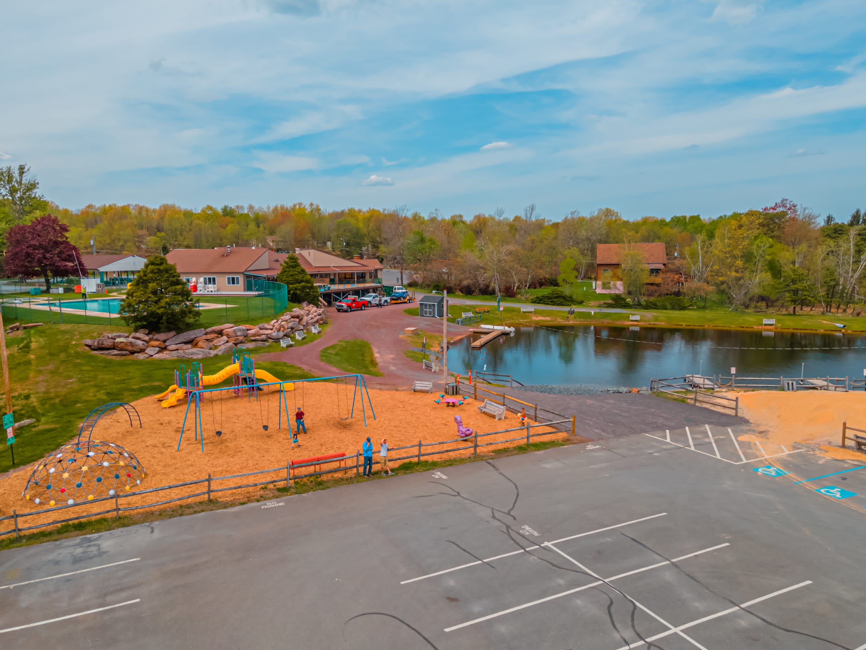 Soak up the sun at the sandy beach area with lounge chairs overlooking the lake.