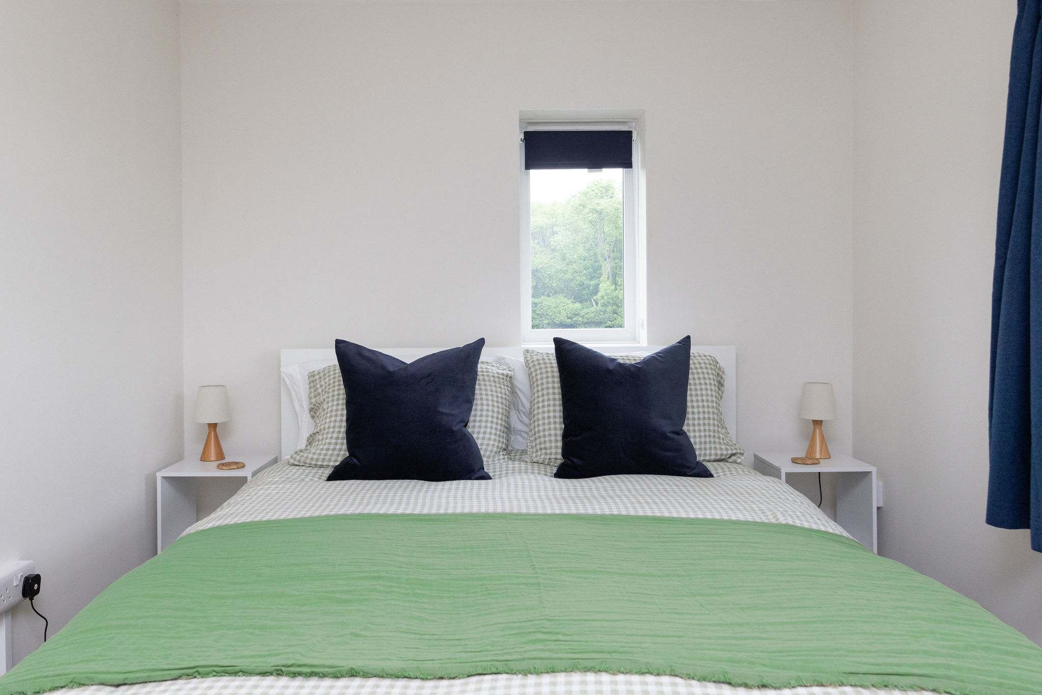 Bedside tables and lamps accompany every bedroom