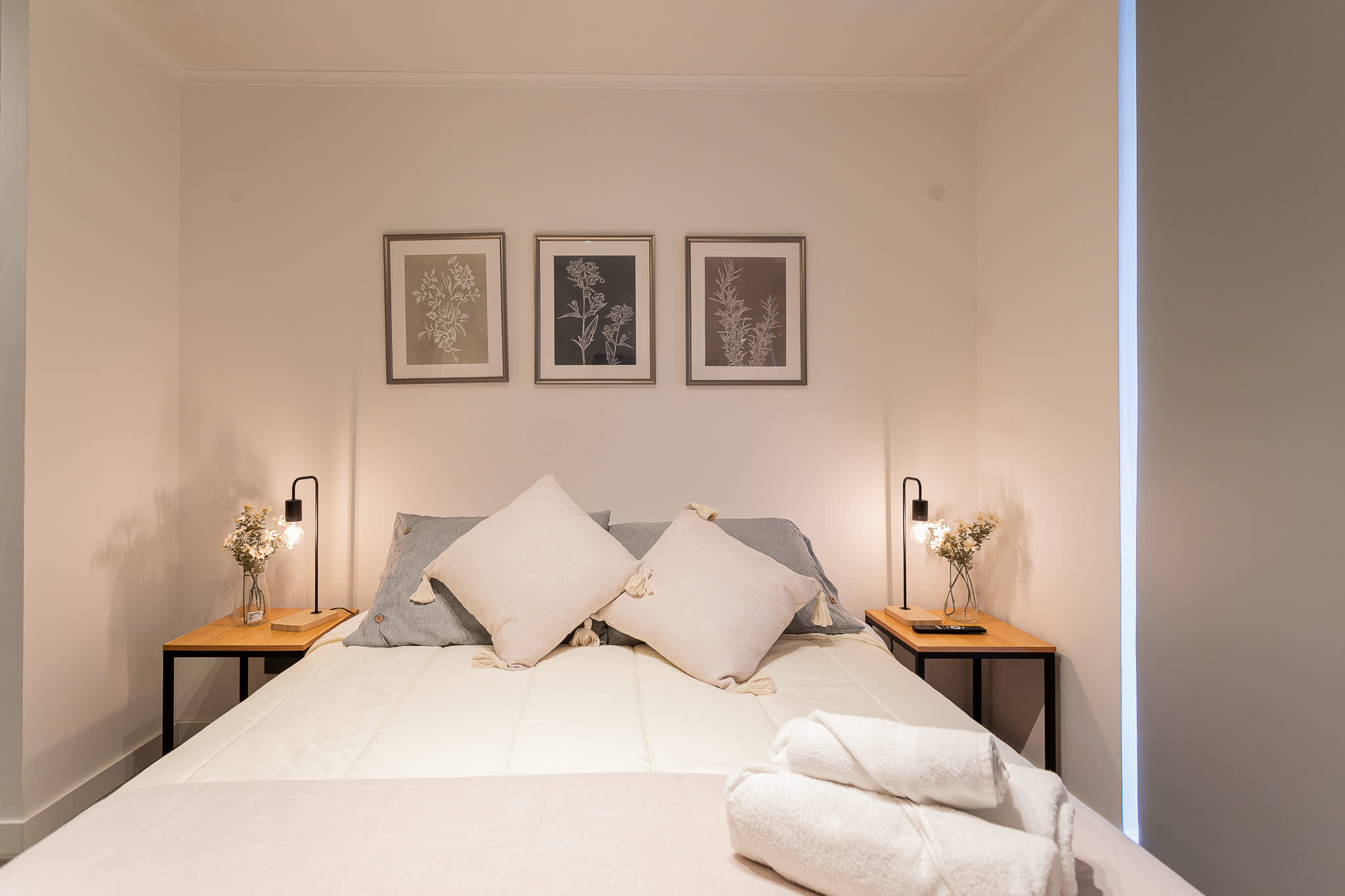 Cozy and serene bedroom with elegant decor and soft lighting, perfect for a restful stay.